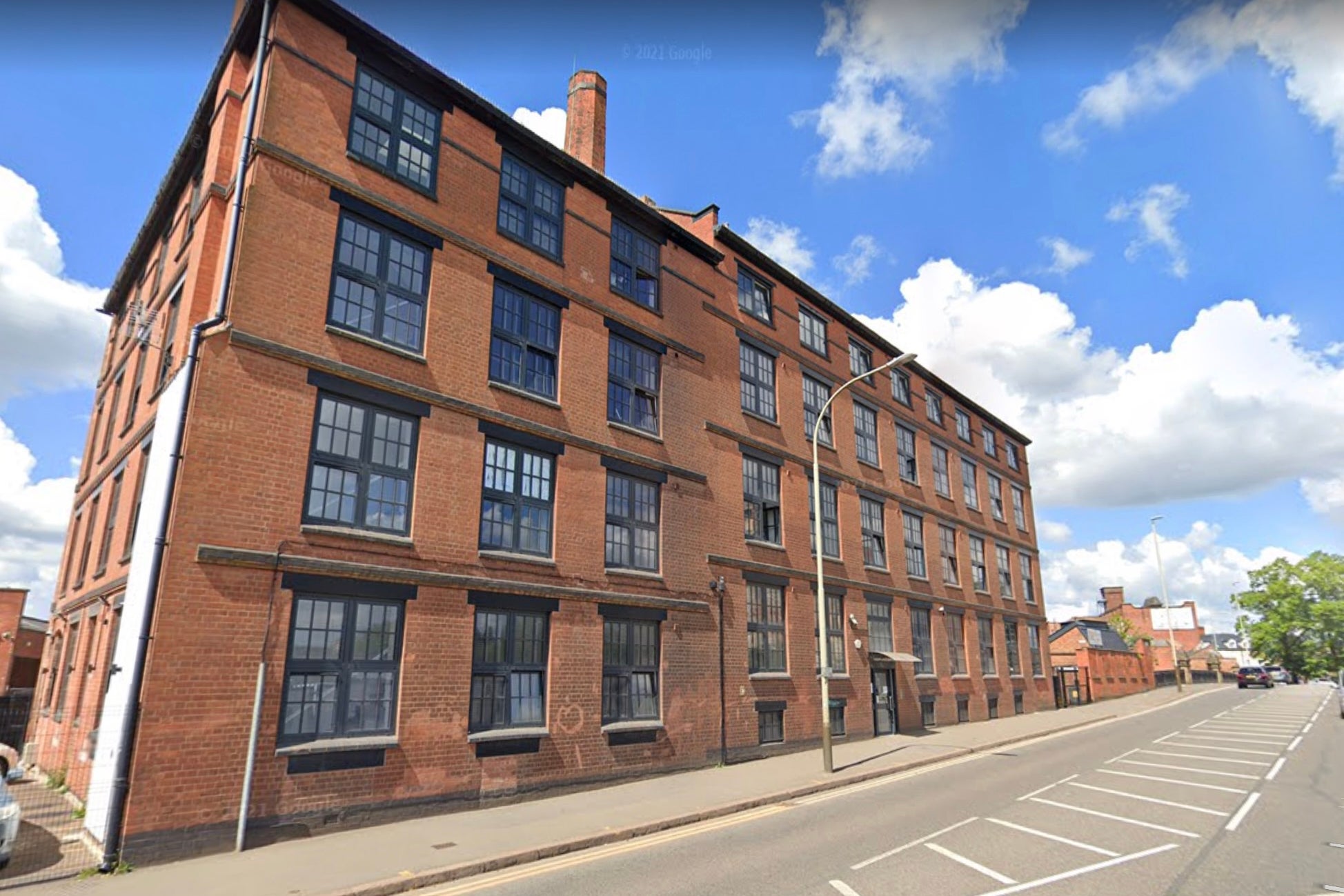 The youngster fell from the second floor of Aadams Apartments in Leicester