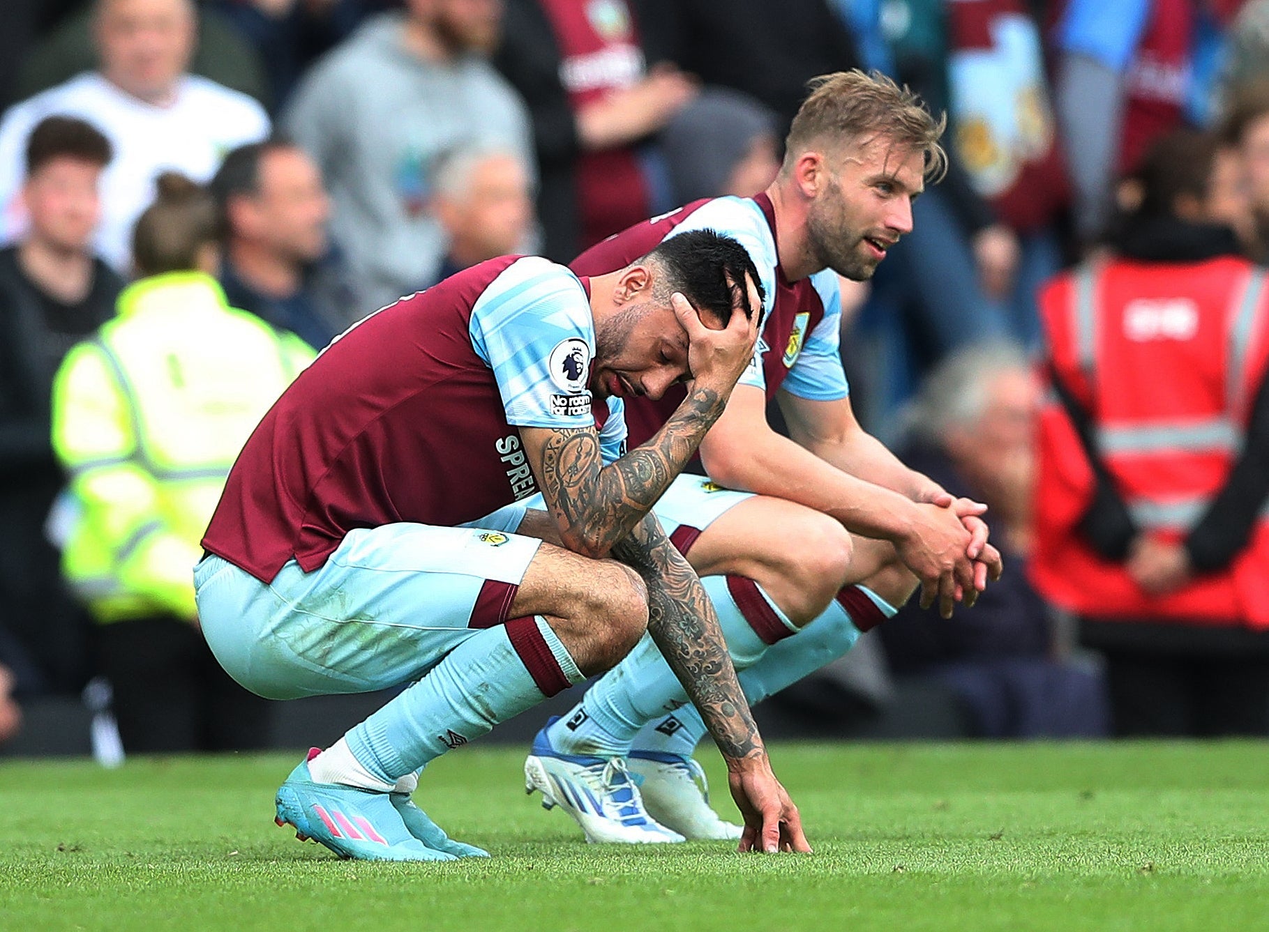 Burnley players react to their relegation from the top flight