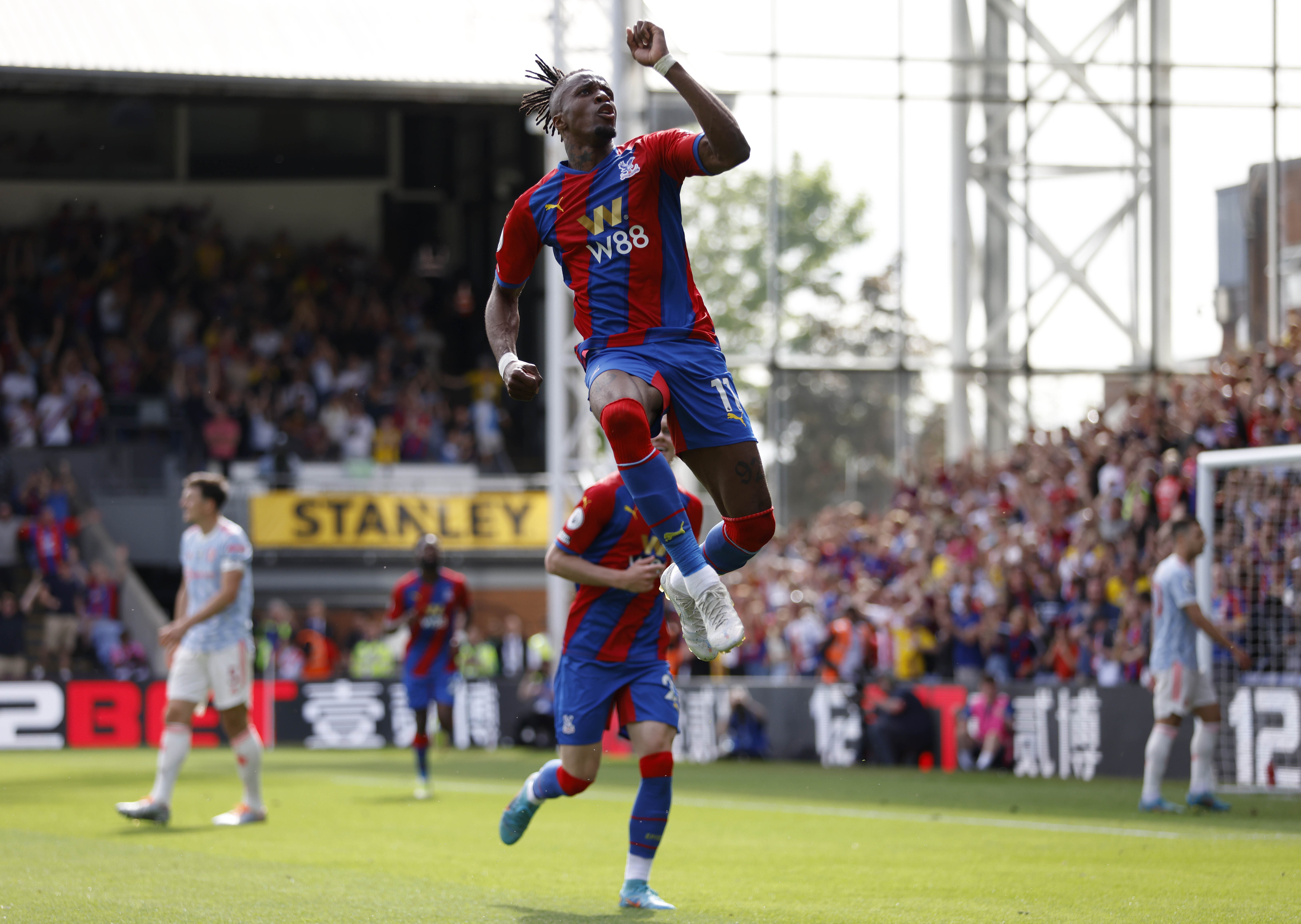 Crystal Palace’s Wilfried Zaha celebrates scoring against Manchester United (Steven Paston/PA)