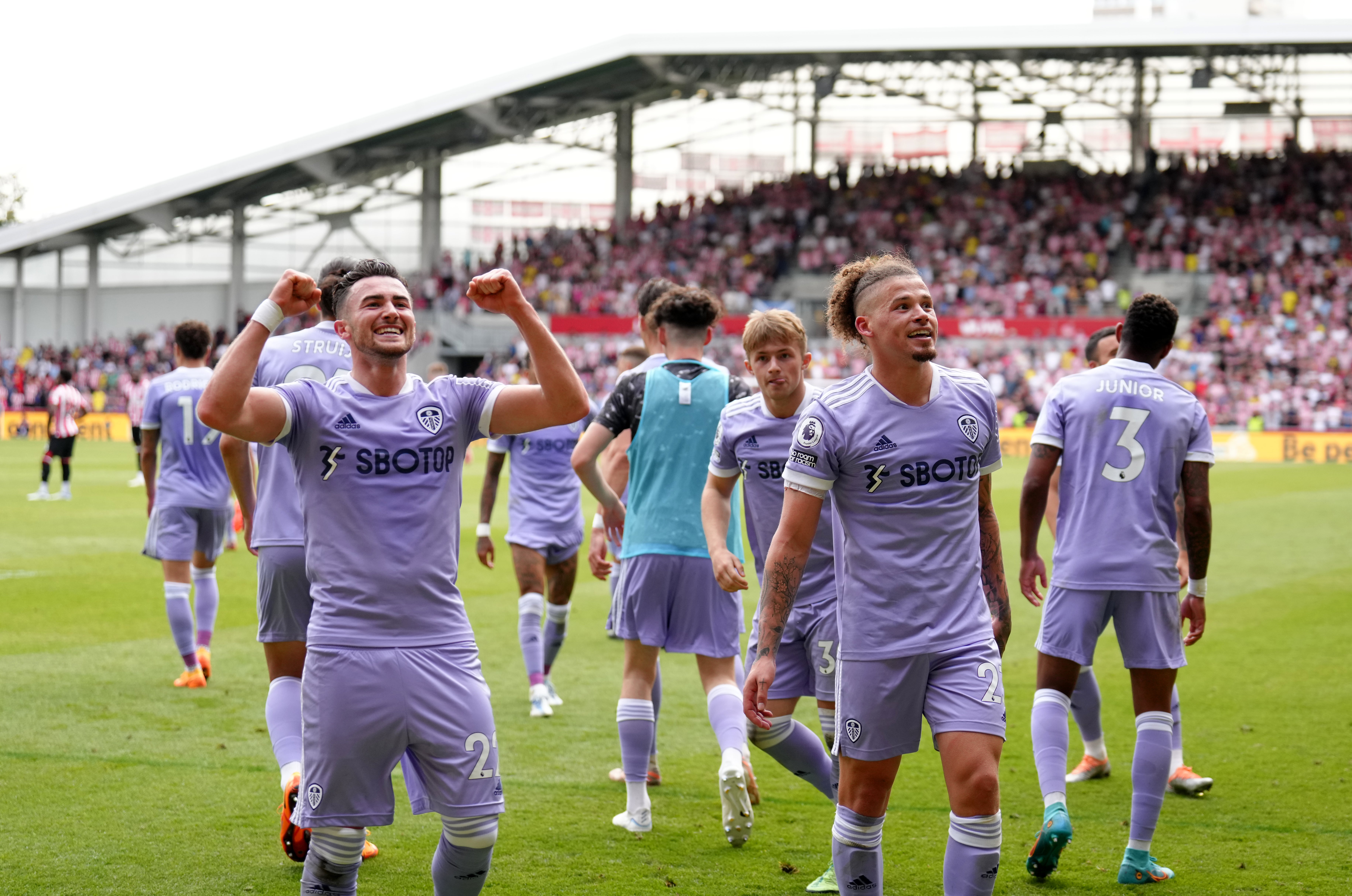 Jack Harrison (left) and Kalvin Phillips celebrate Leeds’ late winner at Brentford