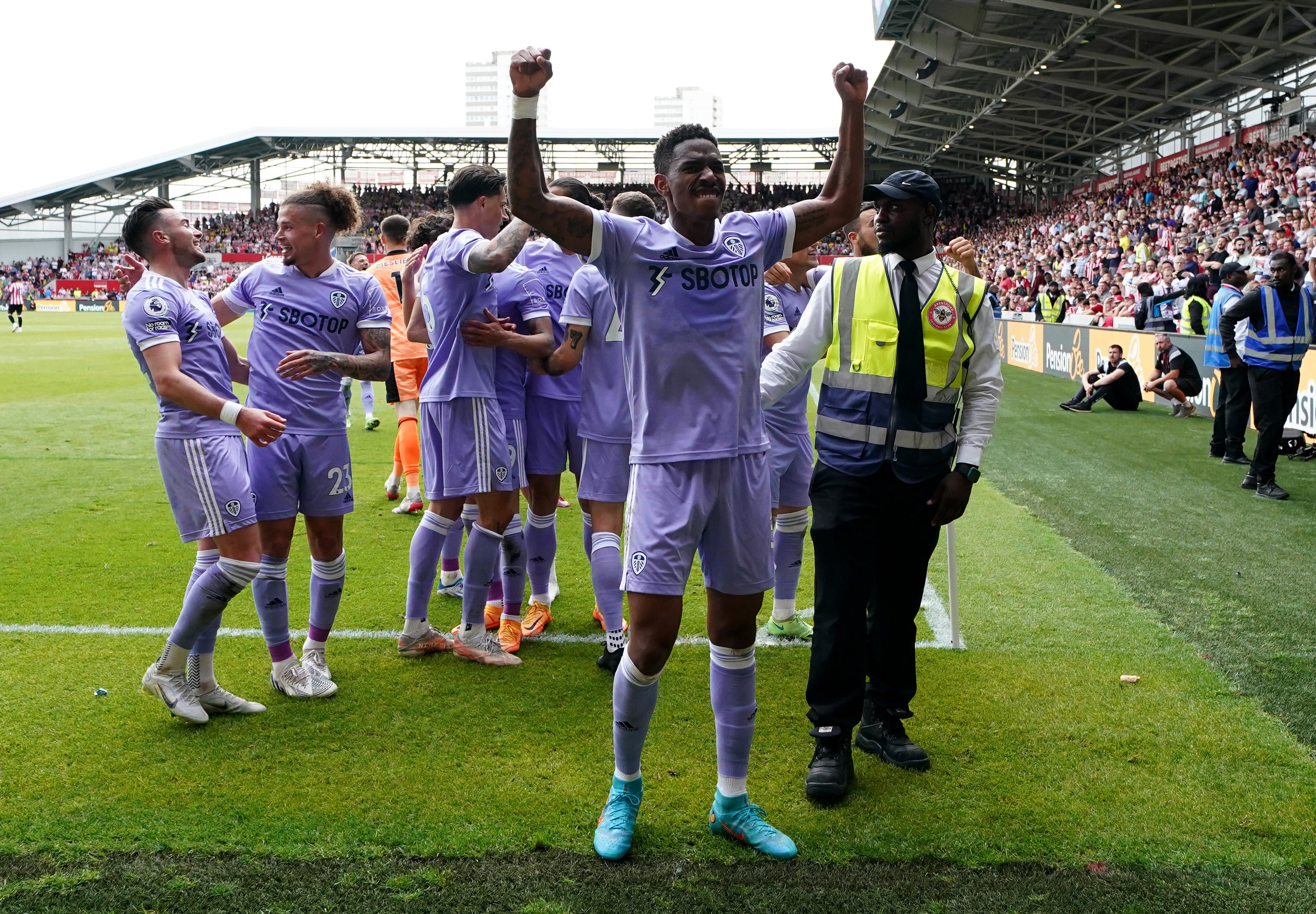 Junior Firpo celebrates Jack Harrison’s late winner at Brentford (John Walton/PA Images).