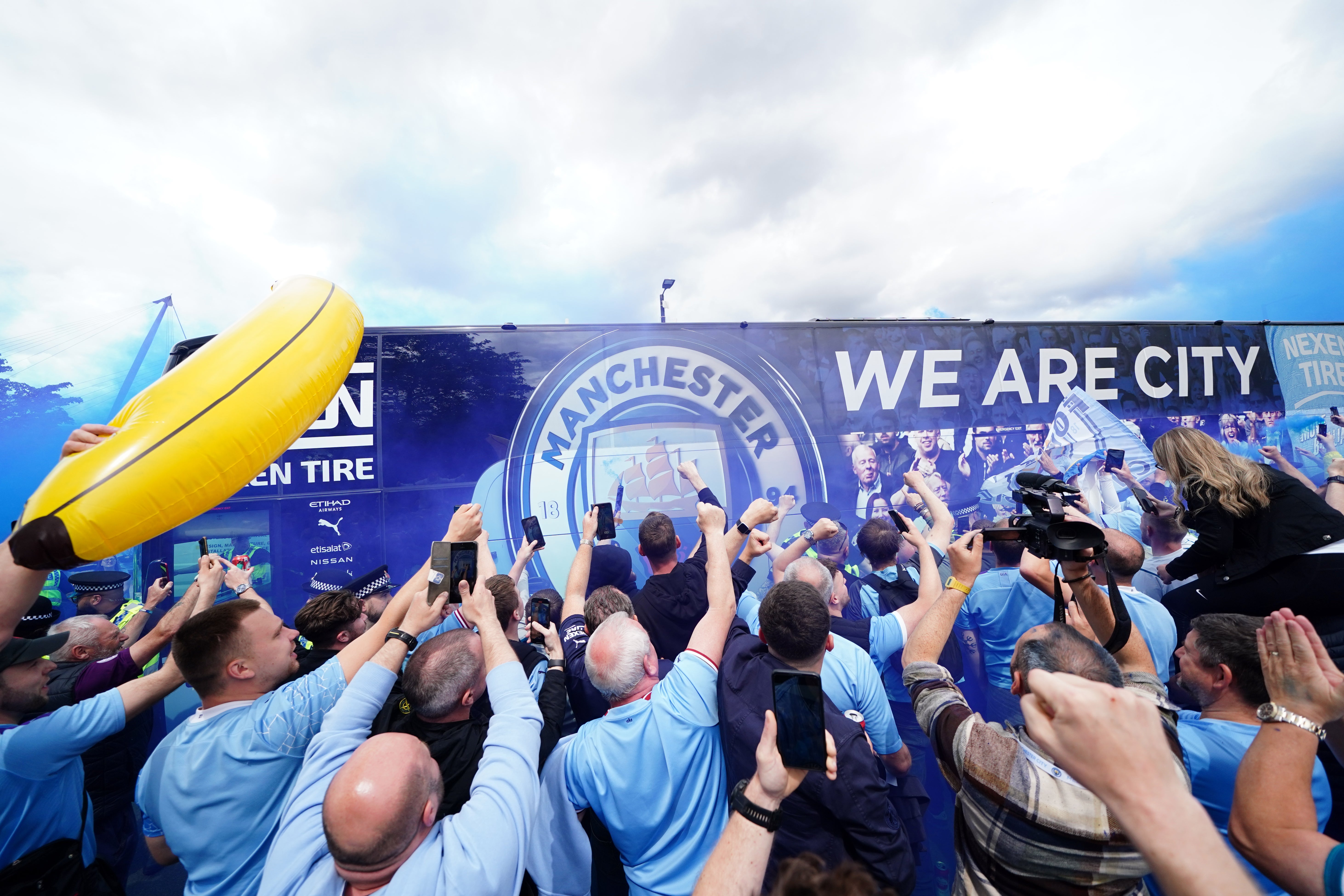 Manchester City fans celebrated on Sunday (PA)