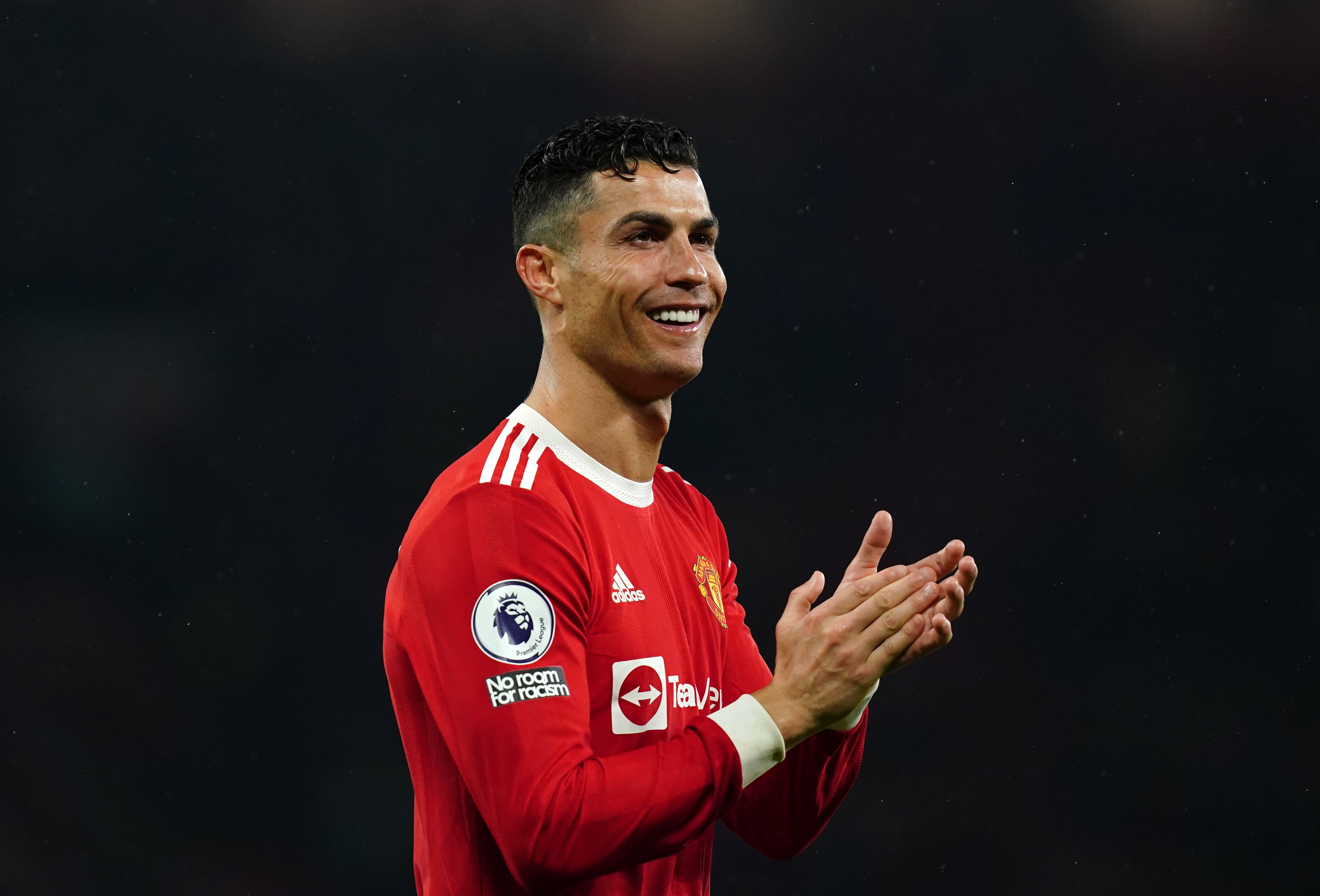 Manchester United’s Cristiano Ronaldo applauds the fans at Old Trafford (Martin Rickett/PA)