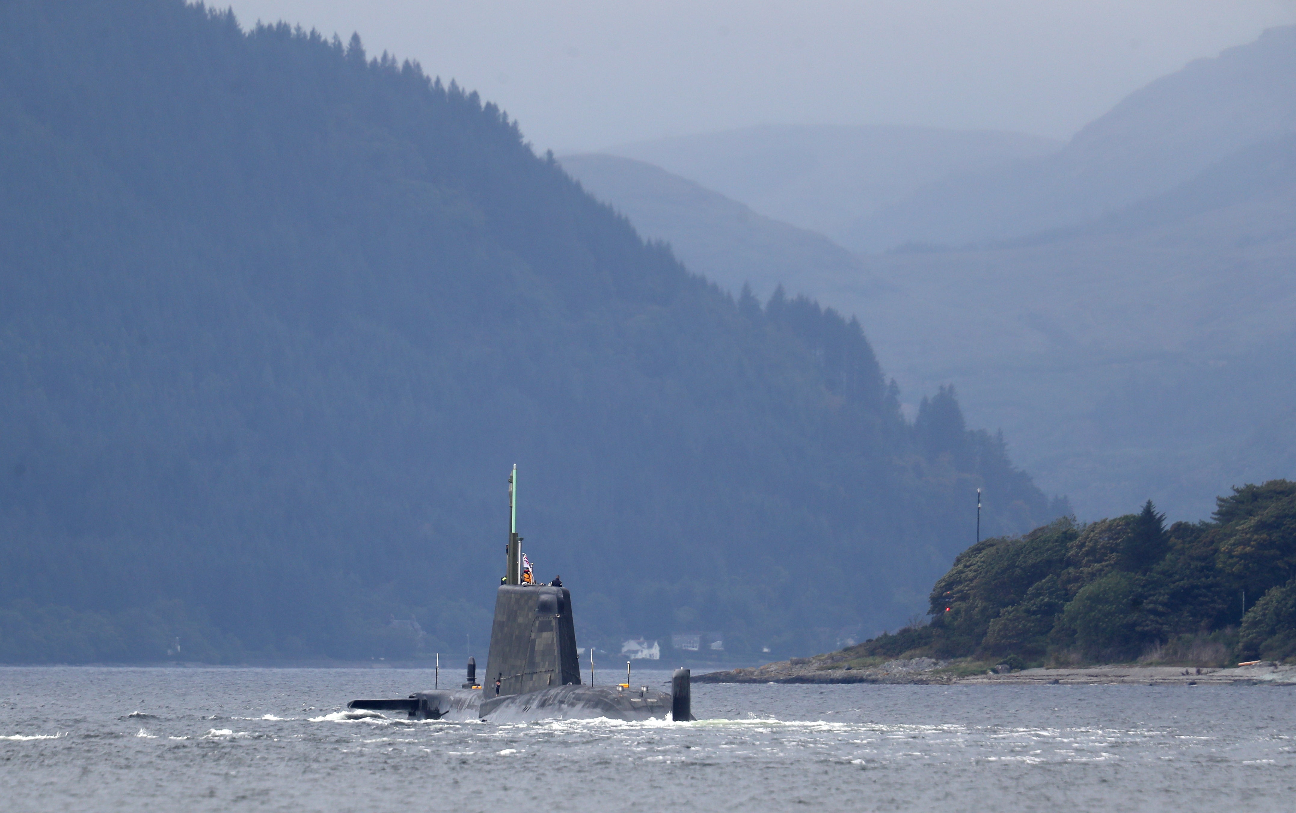 The UK and US are helping Australia to develop nuclear-powered submarines as part of a defence deal announced last year (Andrew Milligan/PA)