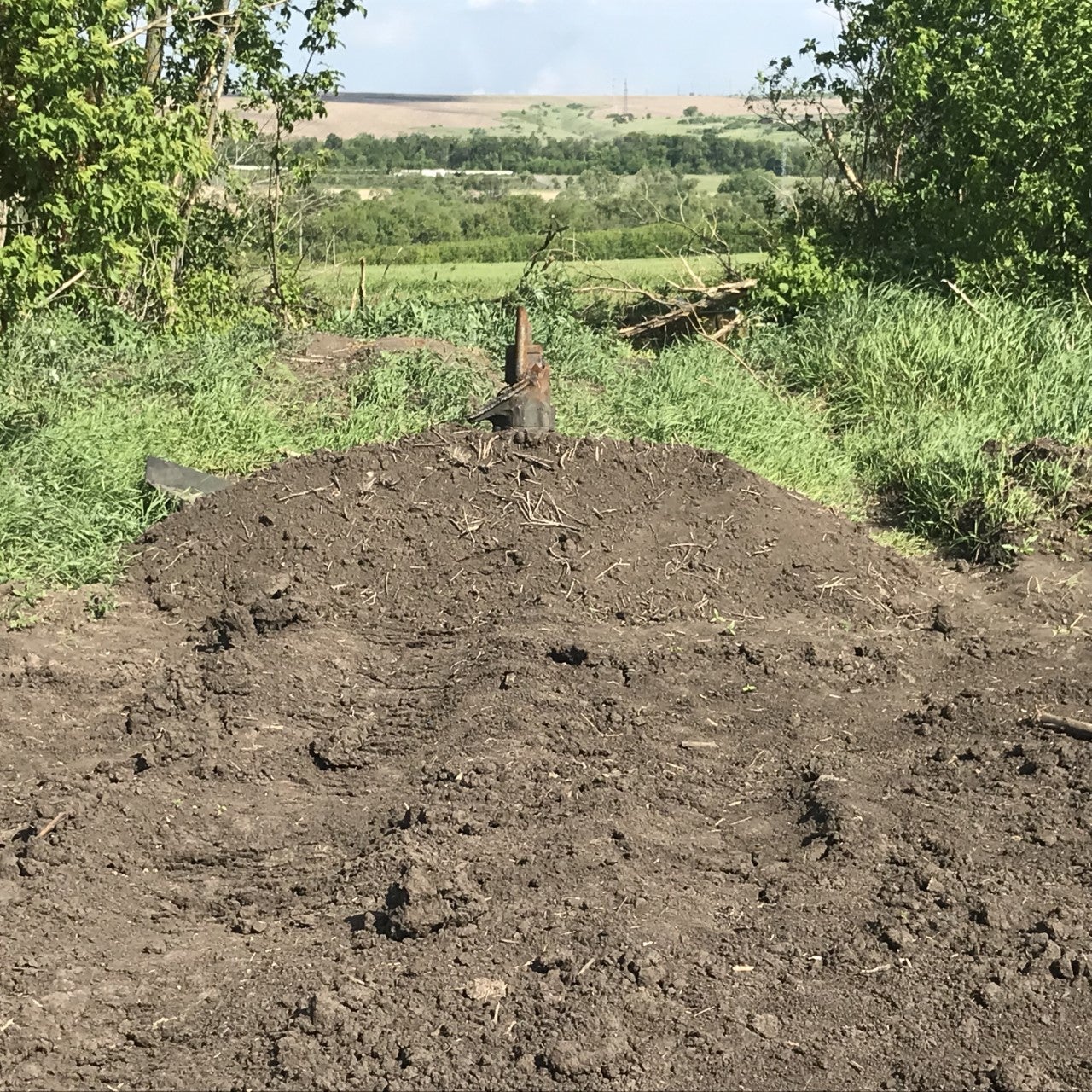 A makeshift burial site for the bodies of Russian forces around the village of Vilkhivka near Kharkiv