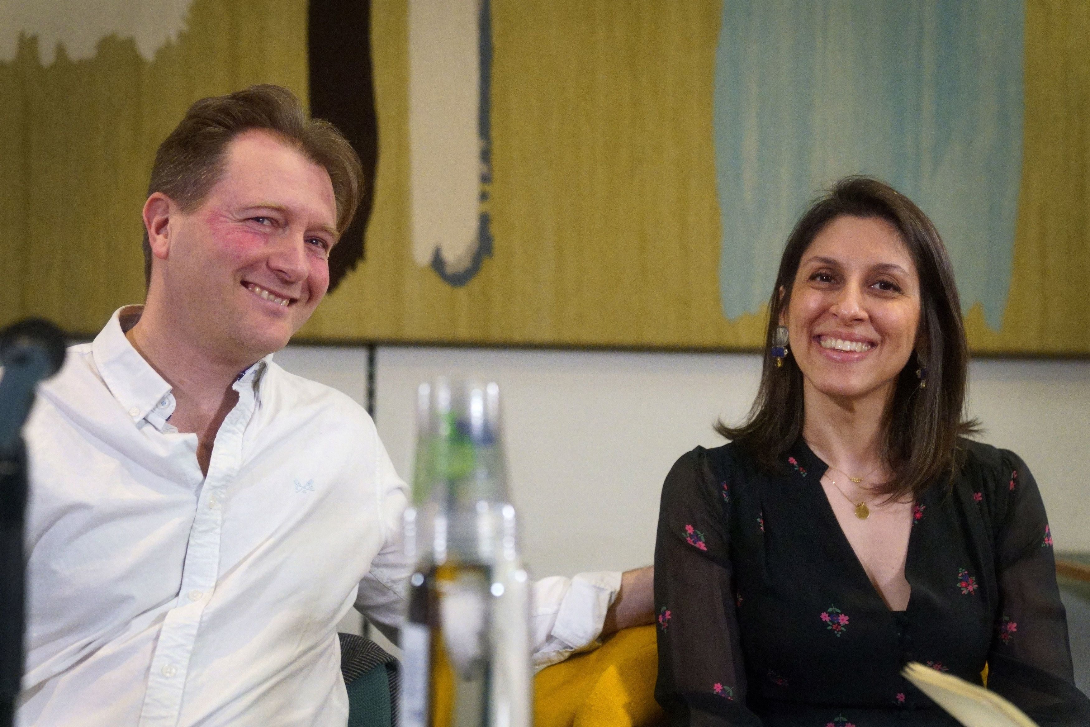 Nazanin Zaghari-Ratcliffe and her husband Richard Ratcliffe (L) attend a press conference hosted by MP Tulip Siddiq following her release after six years imprisonment in Iran