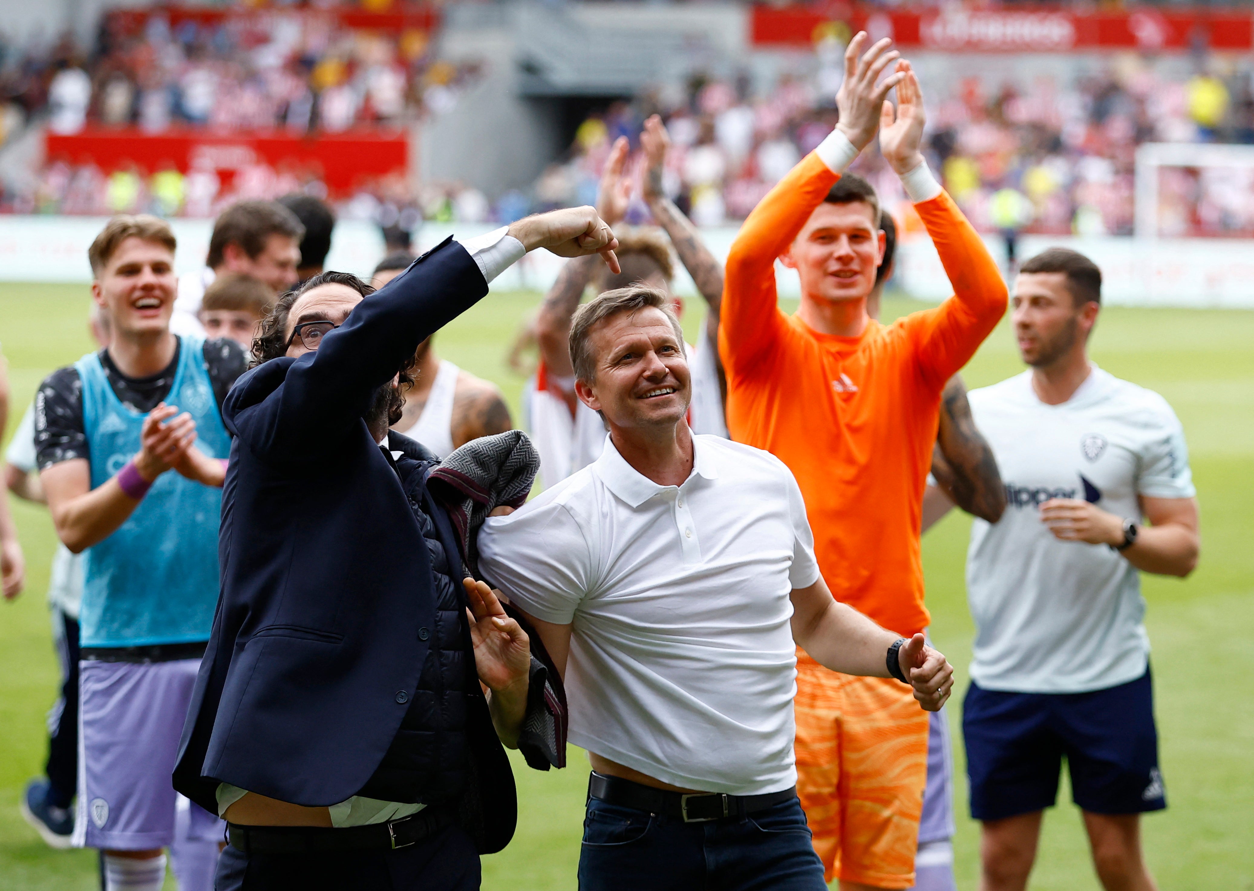 Leeds manager Jesse Marsch celebrates with director of football Victor Orta