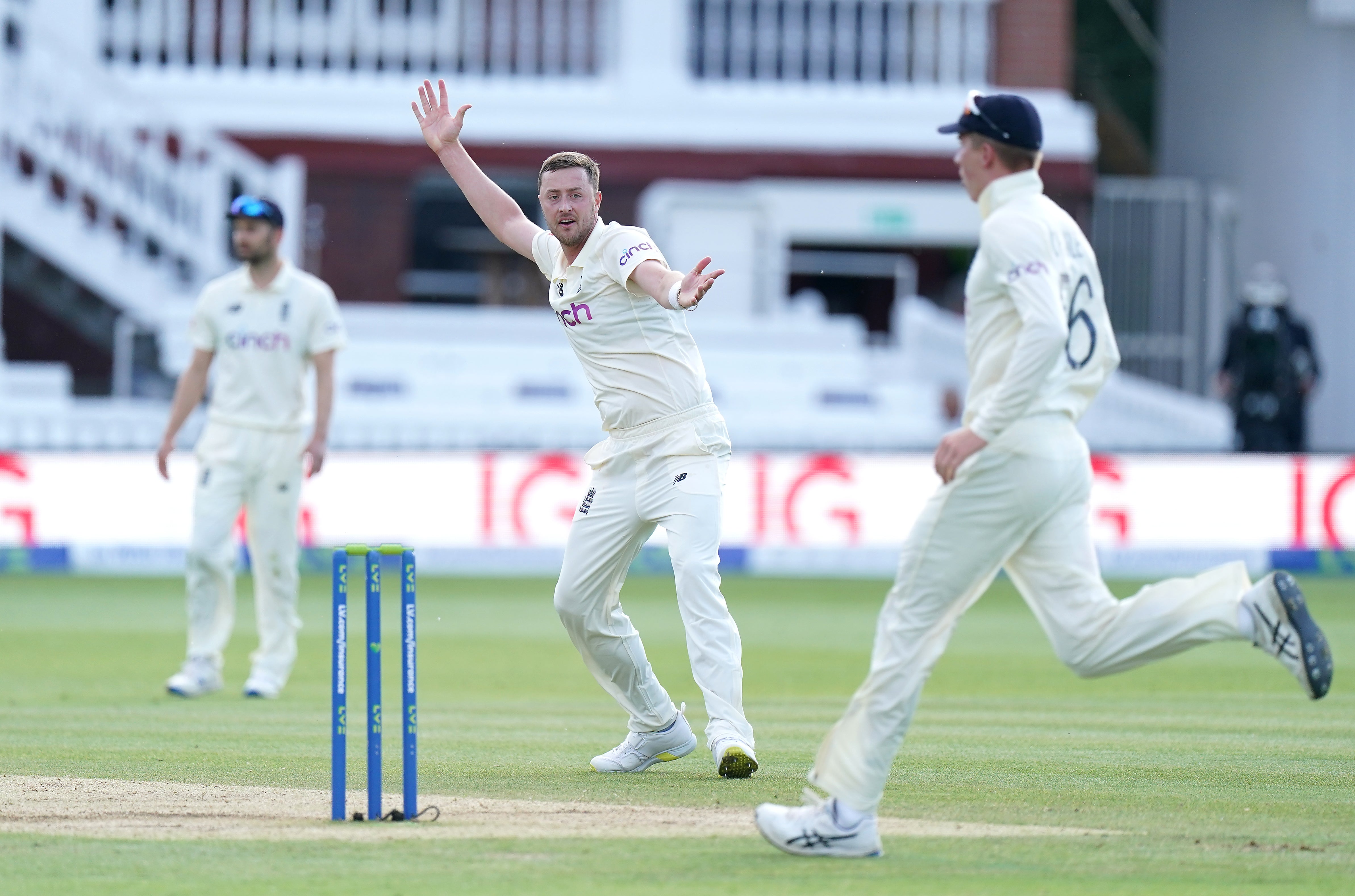 Robinson (centre) made his Test debut against New Zealand last summer (Adam Davy/PA)