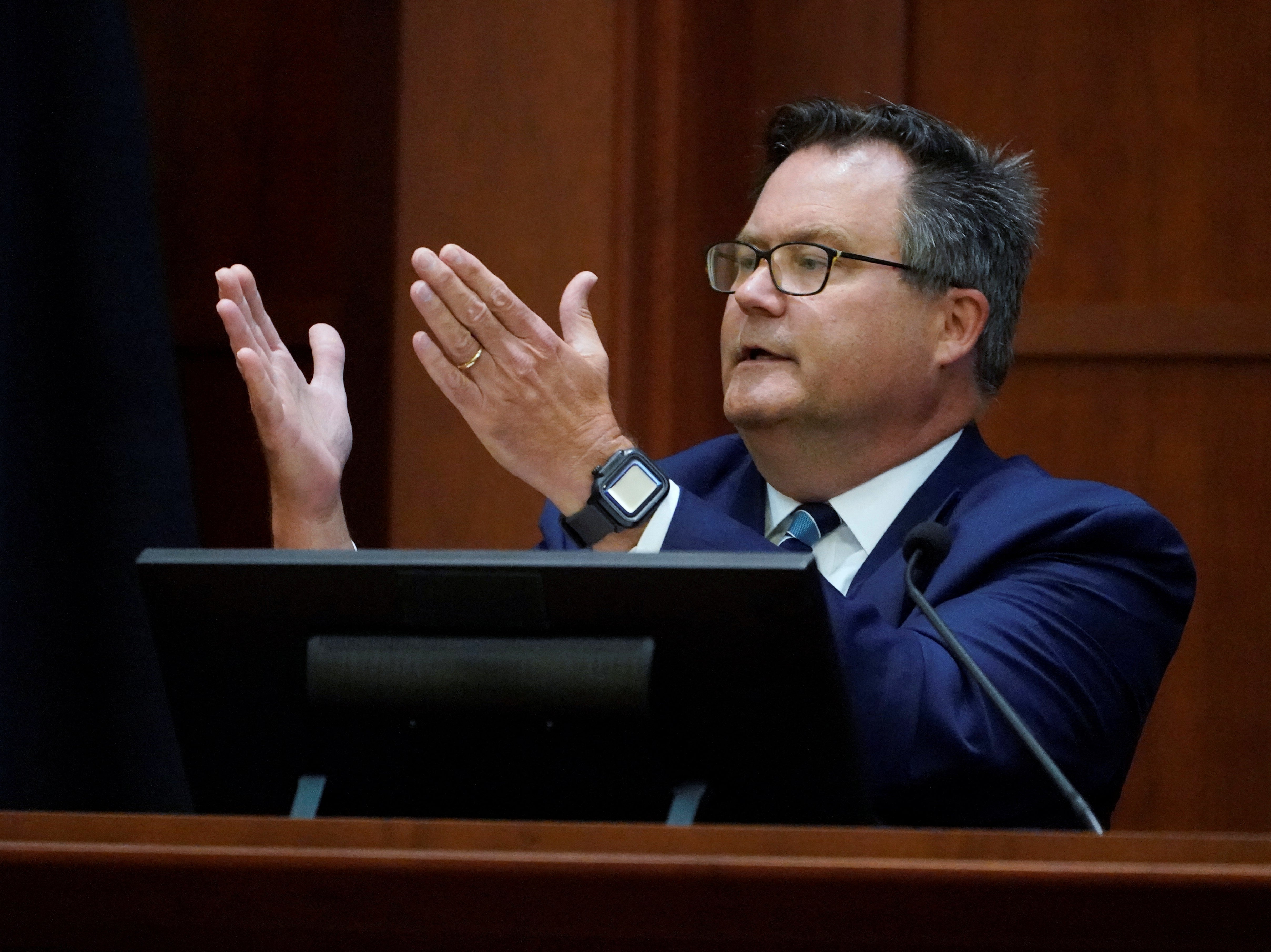 Dr. Richard Moore, Jr., testifies in the courtroom during actor Johnny Depp's defamation case against ex-wife, actor Amber Heard, at the Fairfax County Circuit Courthouse in Fairfax, U.S., May 23, 2022