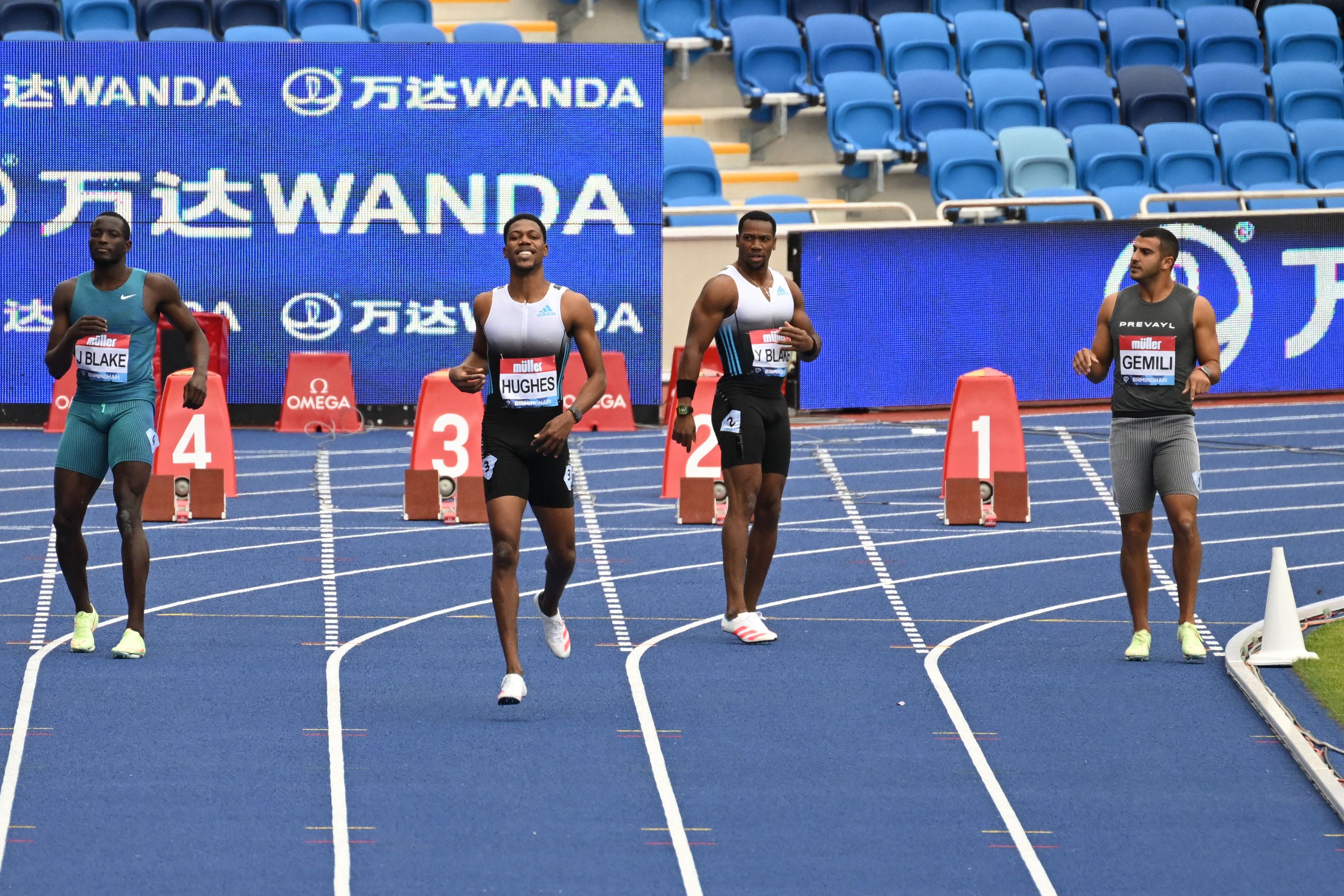 Zharnel Hughes is disqualified after a false start in the men’s 100m