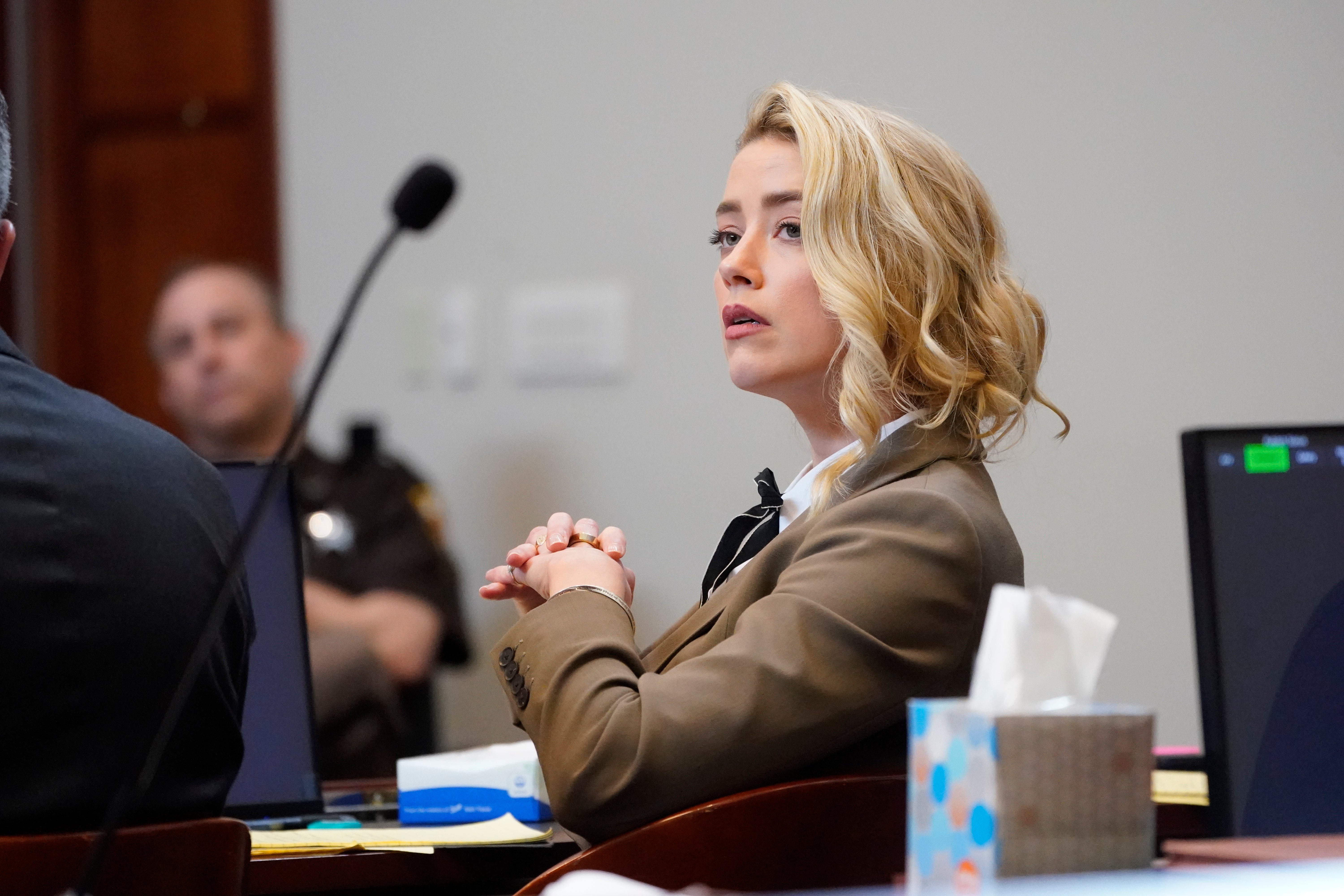 Amber Heard gives evidence