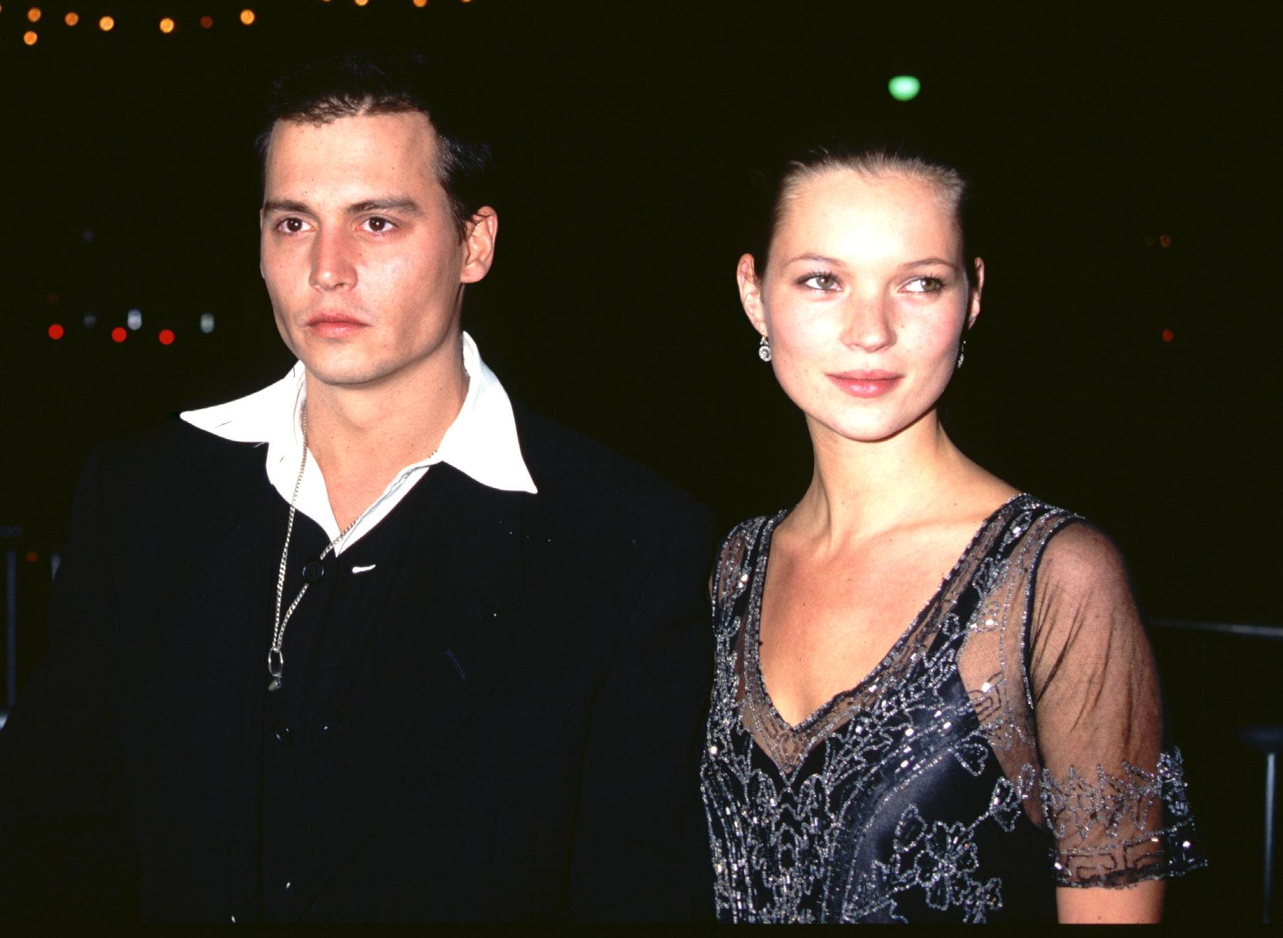 The couple pictured on a red carpet in 1997