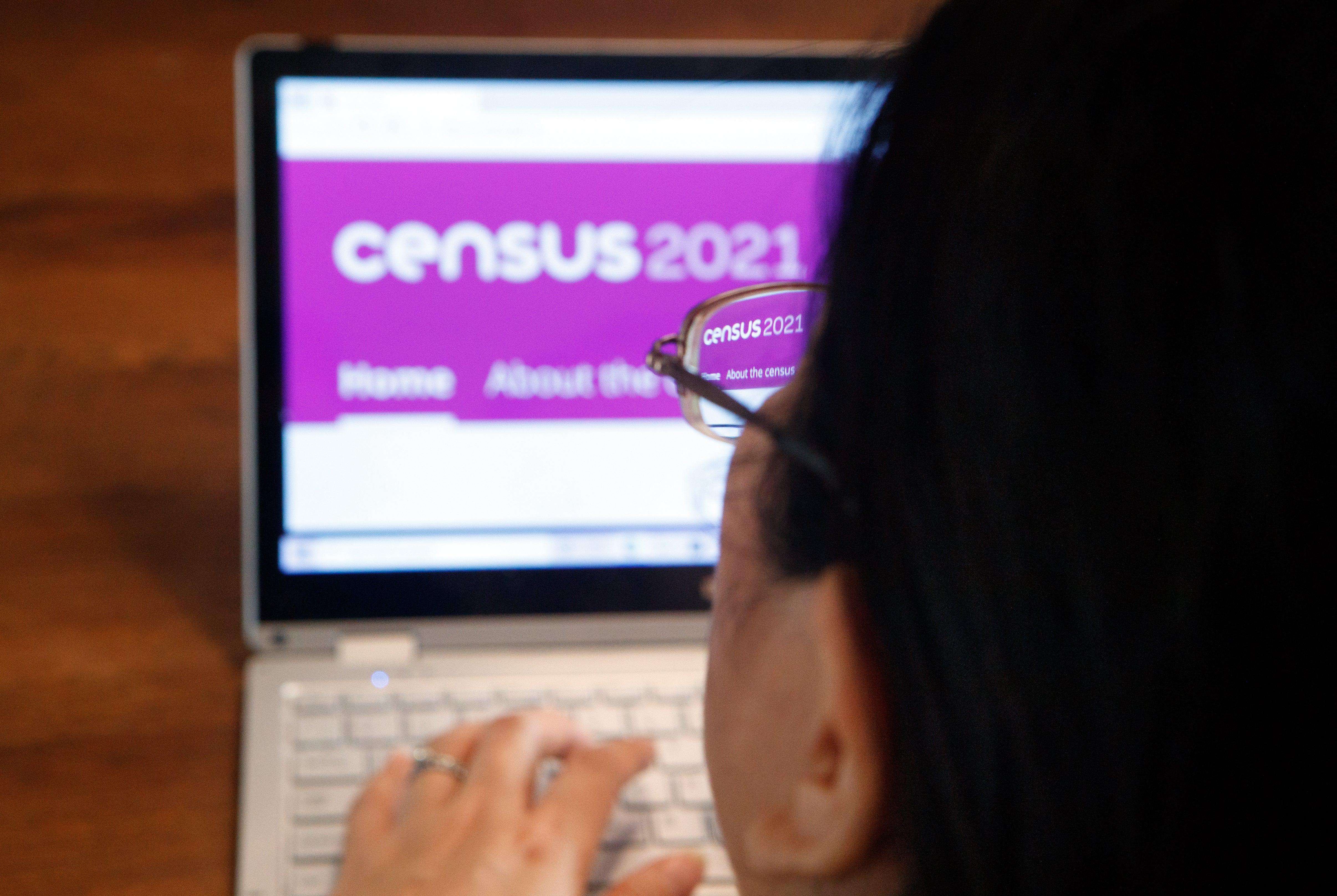 A woman logs on to the census 2021 website (Danny Lawson/PA)