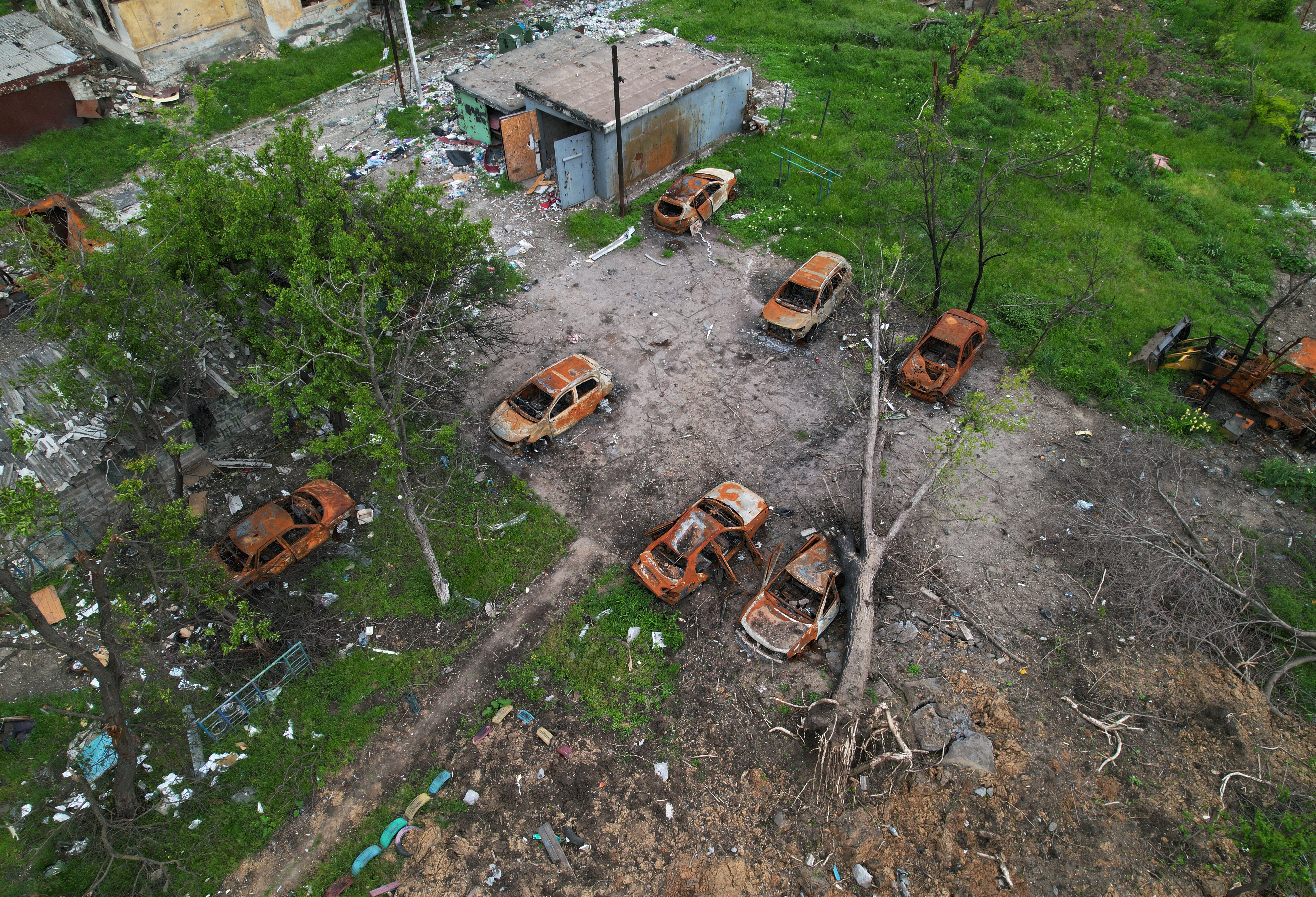 A view shows burned cars in a residential area near Azovstal Iron and Steel Works, during Ukraine-Russia conflict in the southern port city of Mariupol