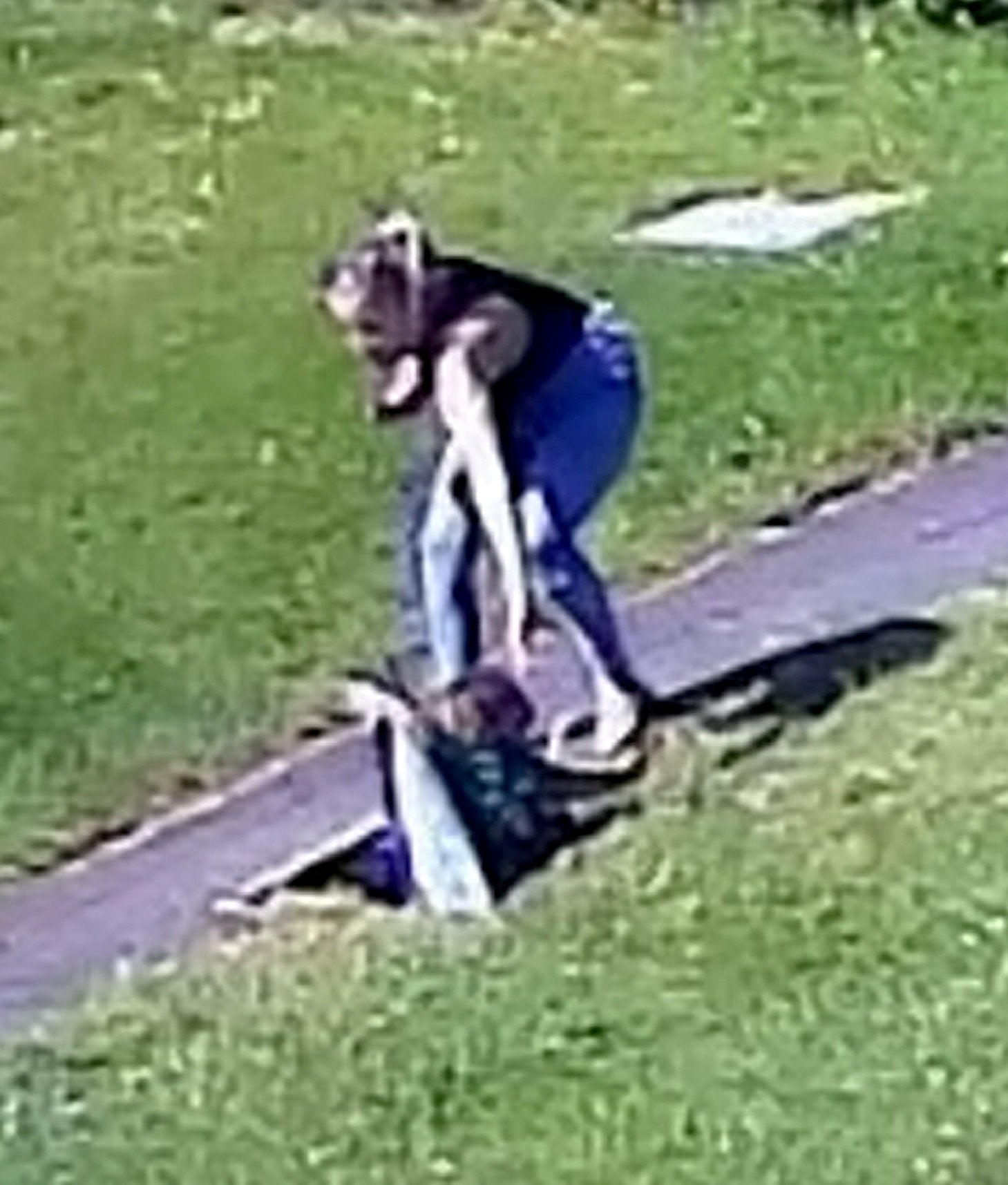 The manhole cover gave way as he walked down the street with his mum