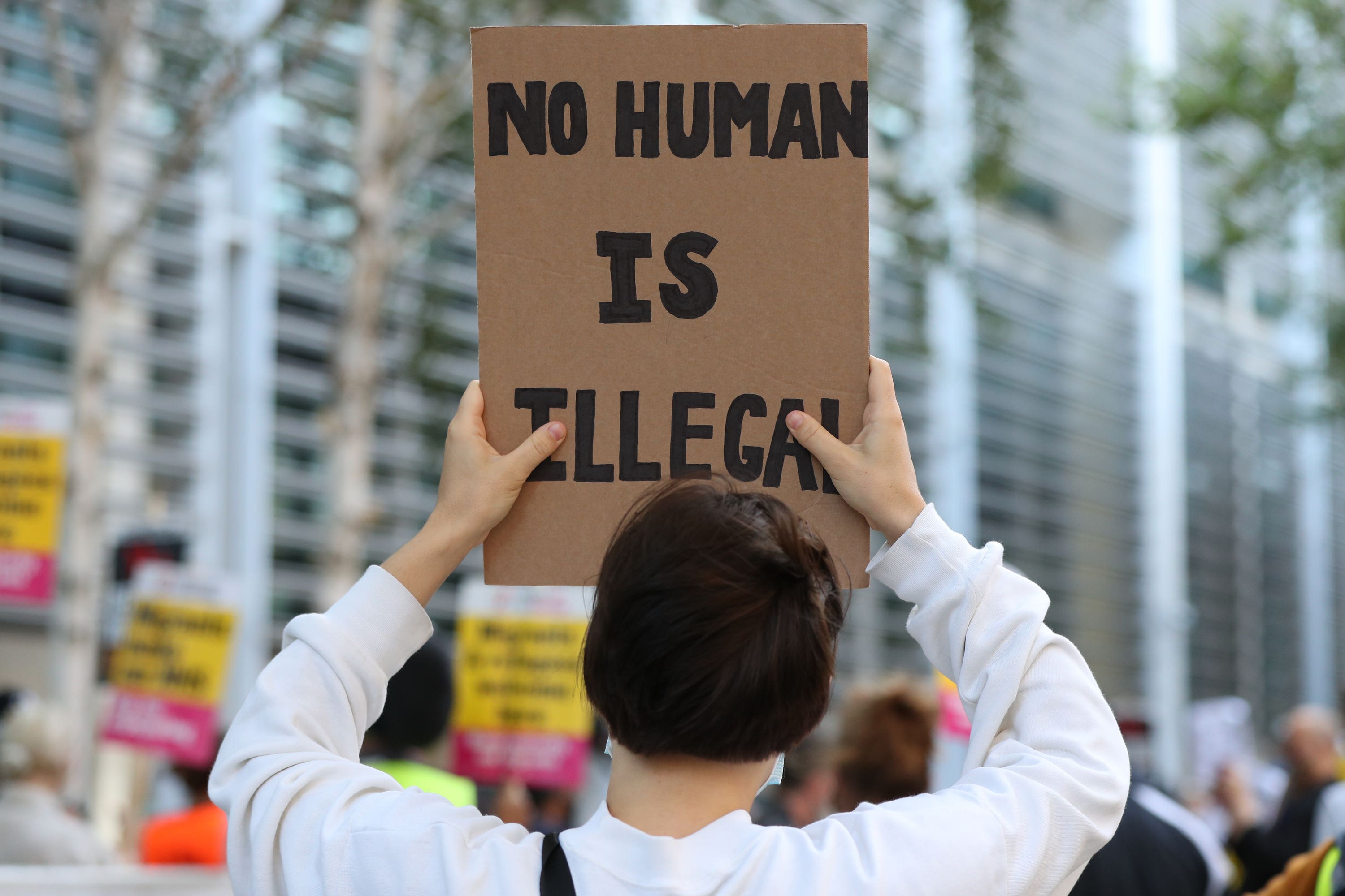 Dozens of demonstrators accuse the government of ‘dehumanising and vilifying’ asylum seekers at a protest outside the Home Office in August 2020