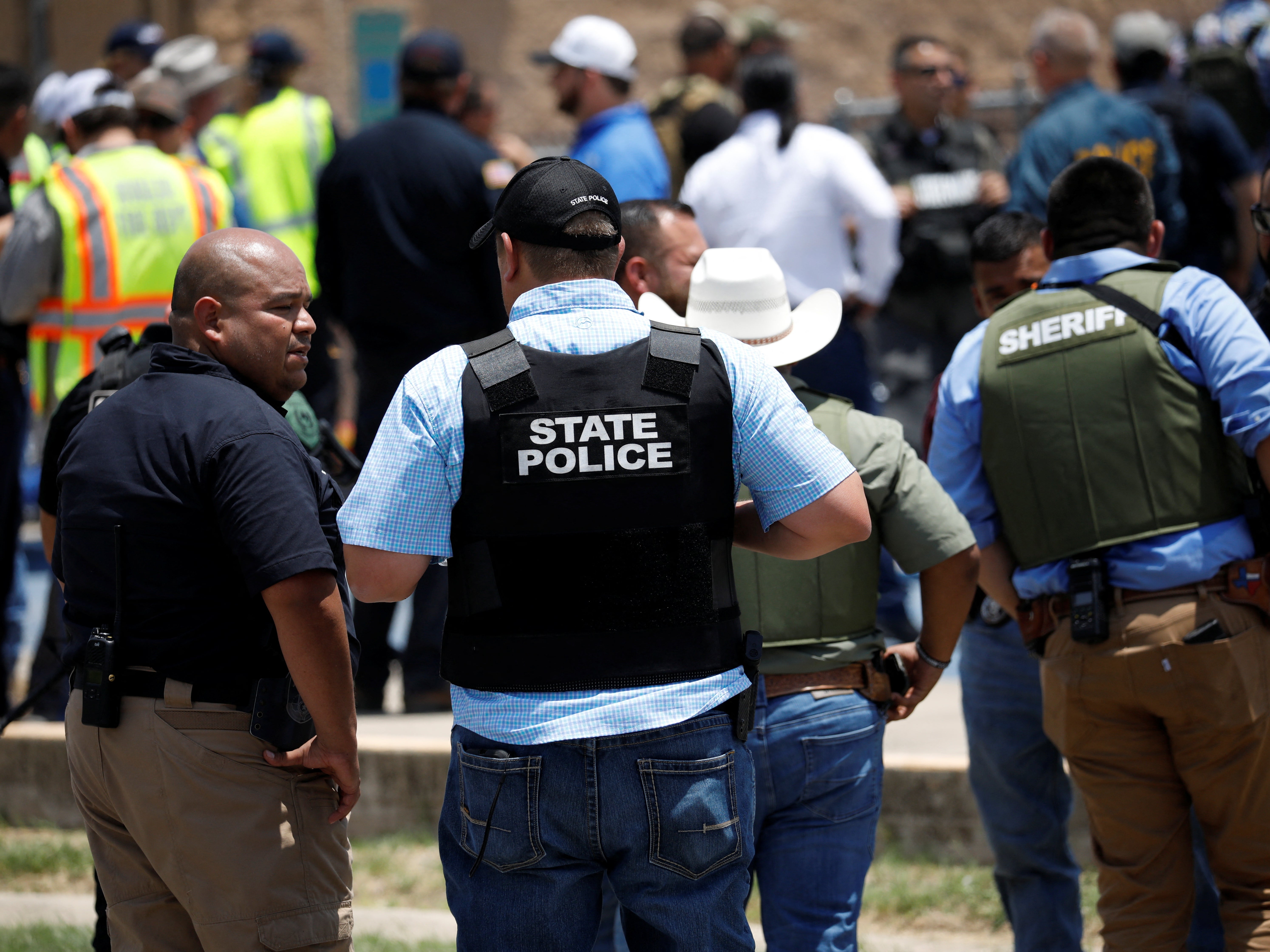 Law enforcement personnel guard the scene of a suspected shooting near Robb Elementary School in Uvalde, Texas, U.S. May 24, 2022