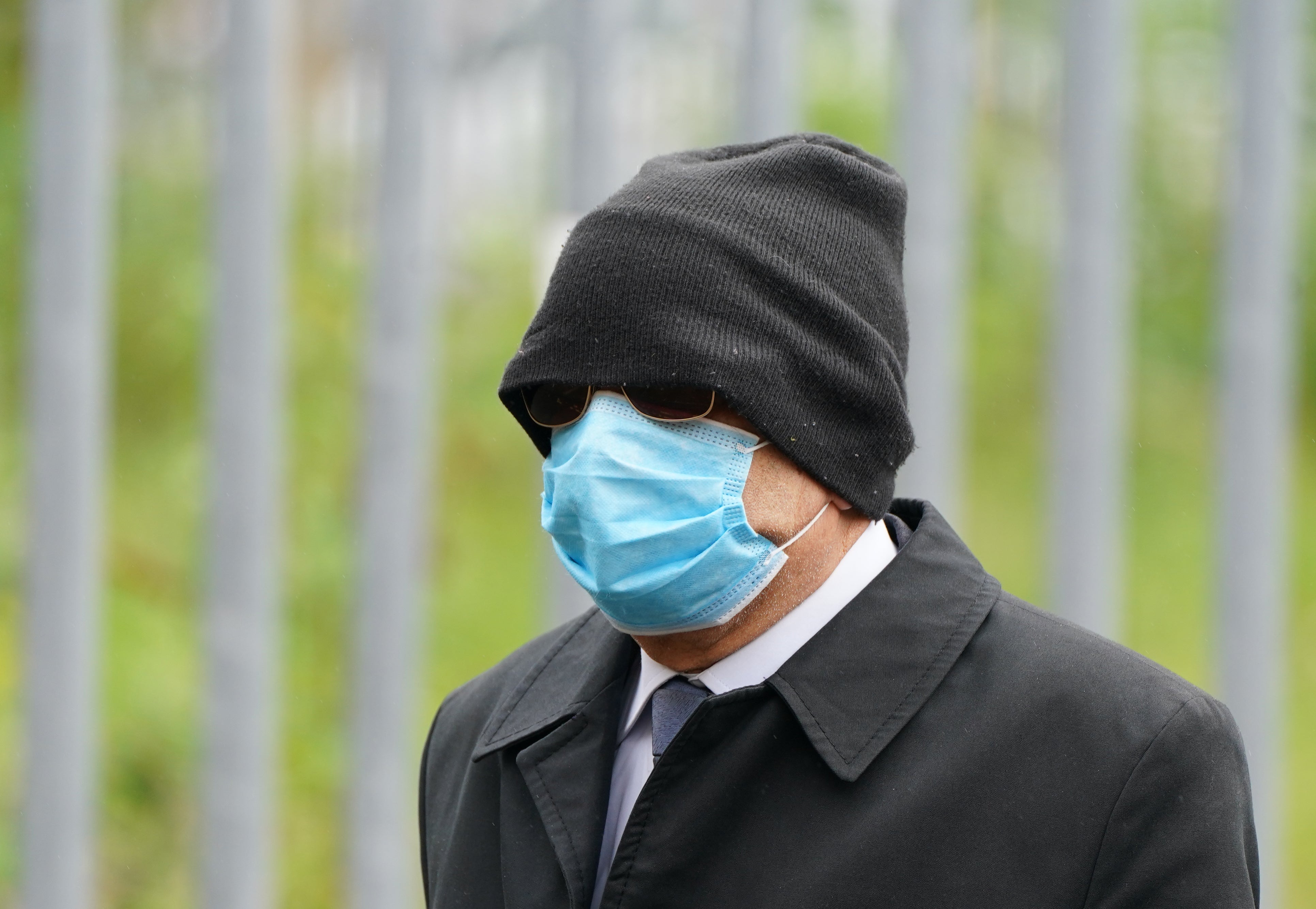 Former doctor Krishna Singh arrives at the High Court in Glasgow (Andrew Milligan/PA)