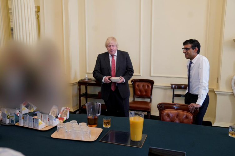 Boris Johnson and Rishi Sunak are seen at a gathering for the prime minister’s birthday on 19 June 2020