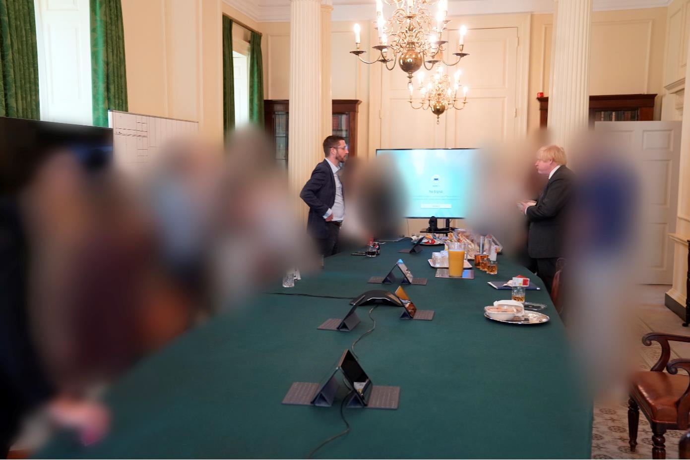 Prime Minister Boris Johnson (right) at a gathering in the Cabinet Room in 10 Downing Street on his birthday (Sue Gray Report/Cabinet Office/PA)