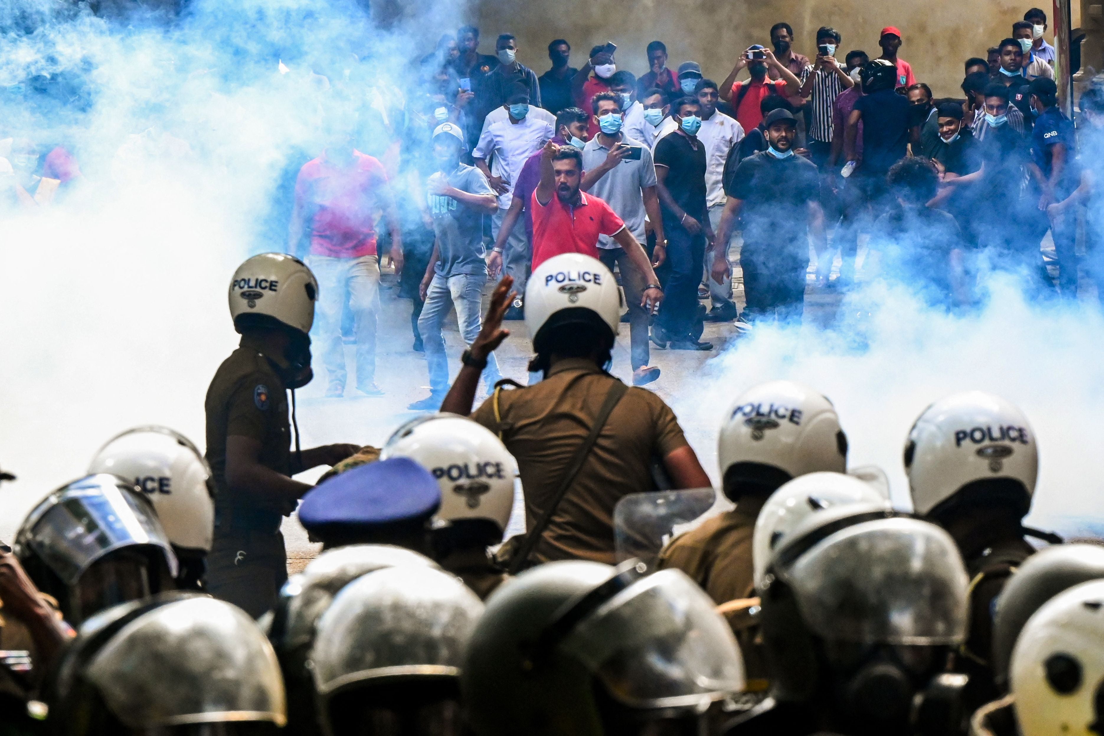 Police use tear gas to disperse Higher National Diploma (HND) students during a demonstration demanding the resignation of Sri Lanka’s President Gotabaya Rajapaksa