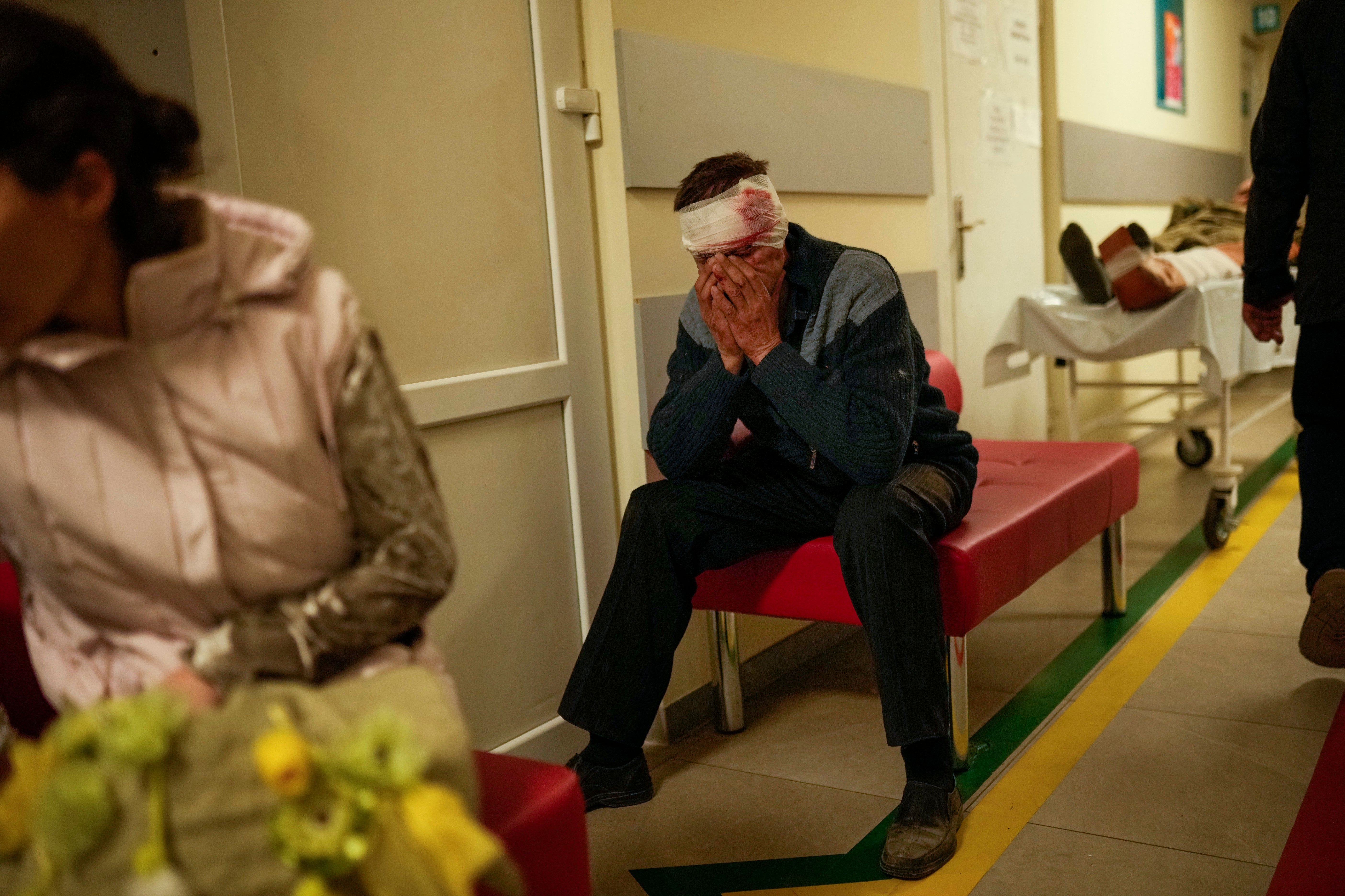 A local resident injured in a Russian strike rests in a hospital in Pokrovsk, Donetsk, on Wednesday