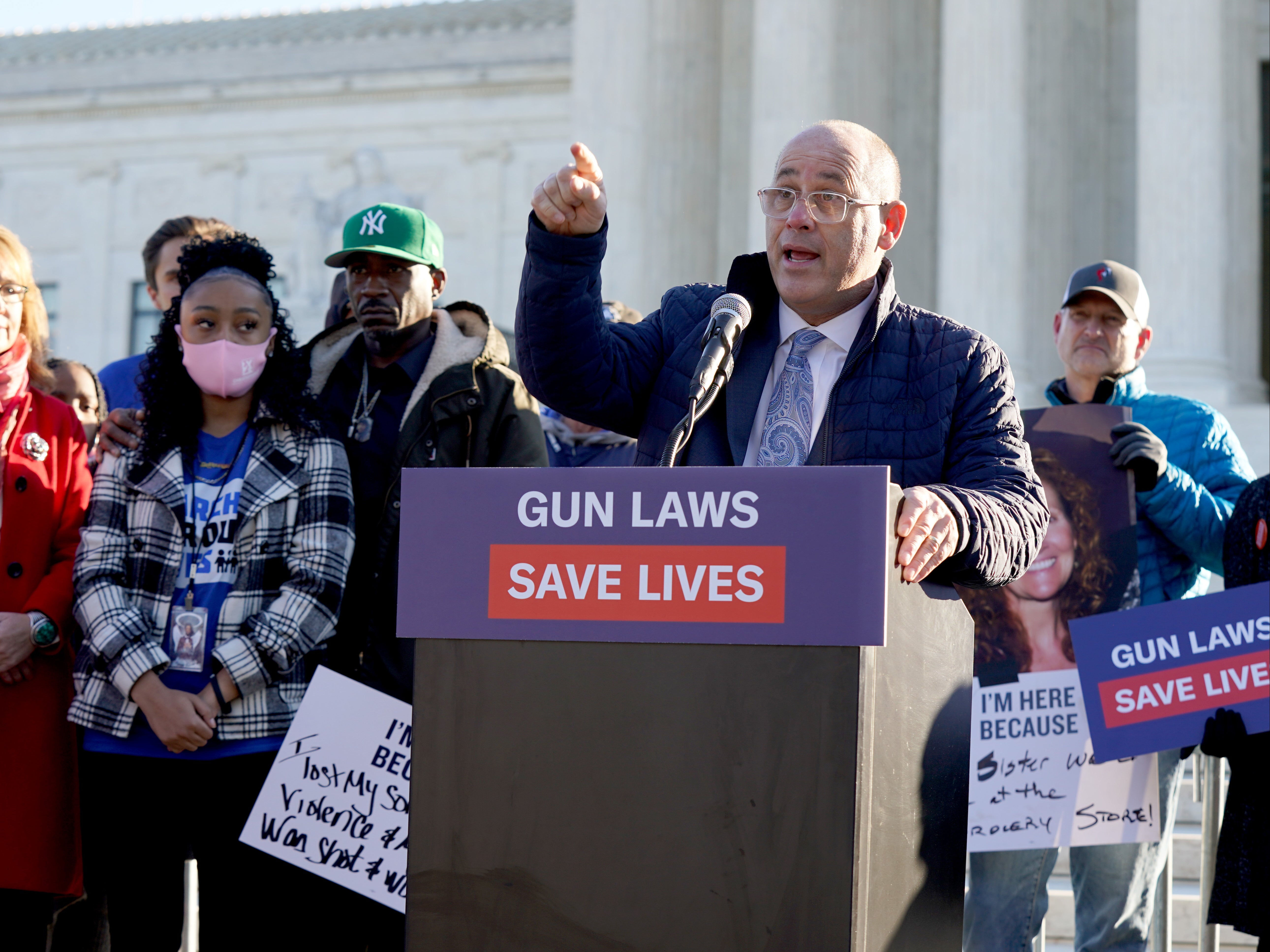 Fred Guttenberg speaks as Gabby Giffords (2L), David Hogg (3L) and gun violence survivors gather in front of the Supreme Court ahead of oral argument in NYSRPA v. Bruen on November 03, 2021 in Washington, DC