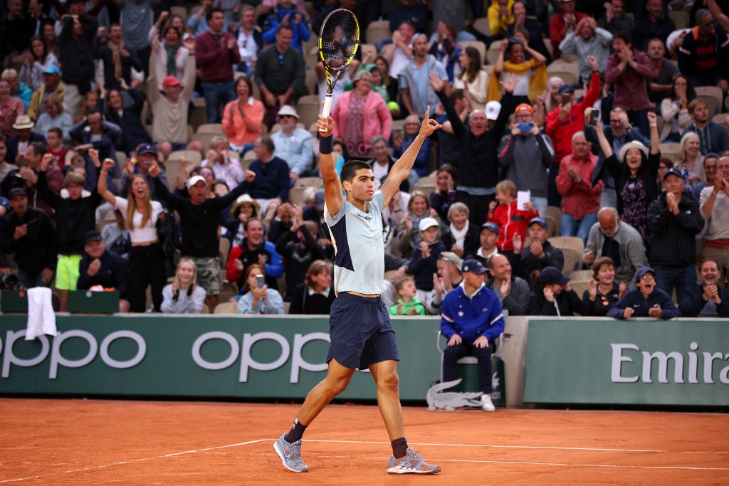 Alcaraz, 19, showed true grit to beat his compatriot Ramos-Vinolas in five sets