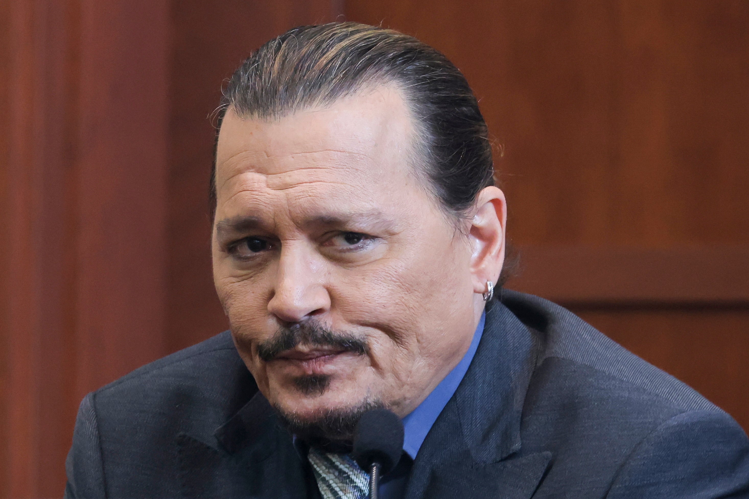 Johnny Depp again denies ‘outlandish’ abuse claims as he returns to stand (Evelyn Hockstein/AP)