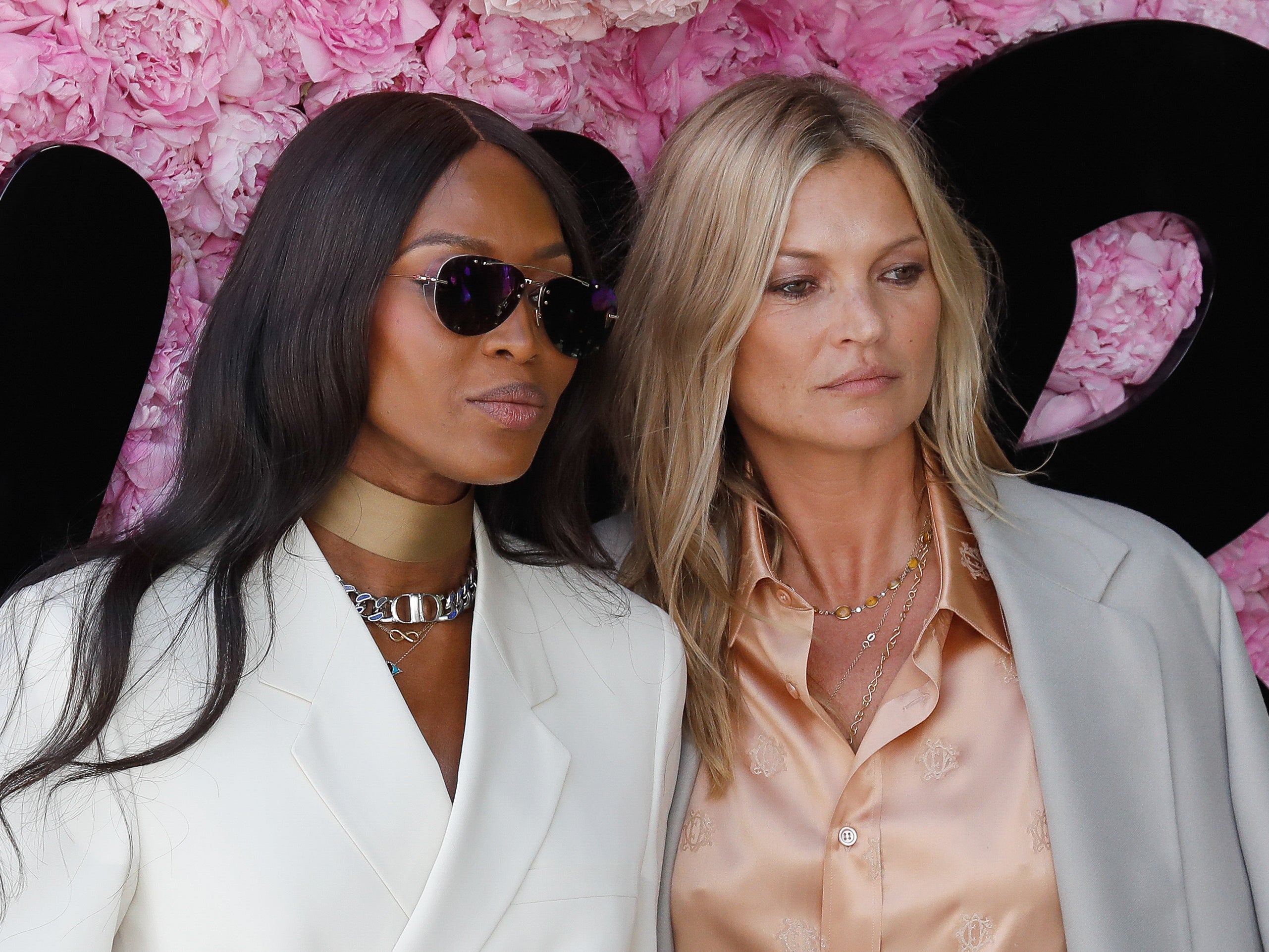 Models Naomi Campbell (L) and Kate Moss attend the Dior Men’s Spring/Summer 2019 fashion show on June 23, 2018