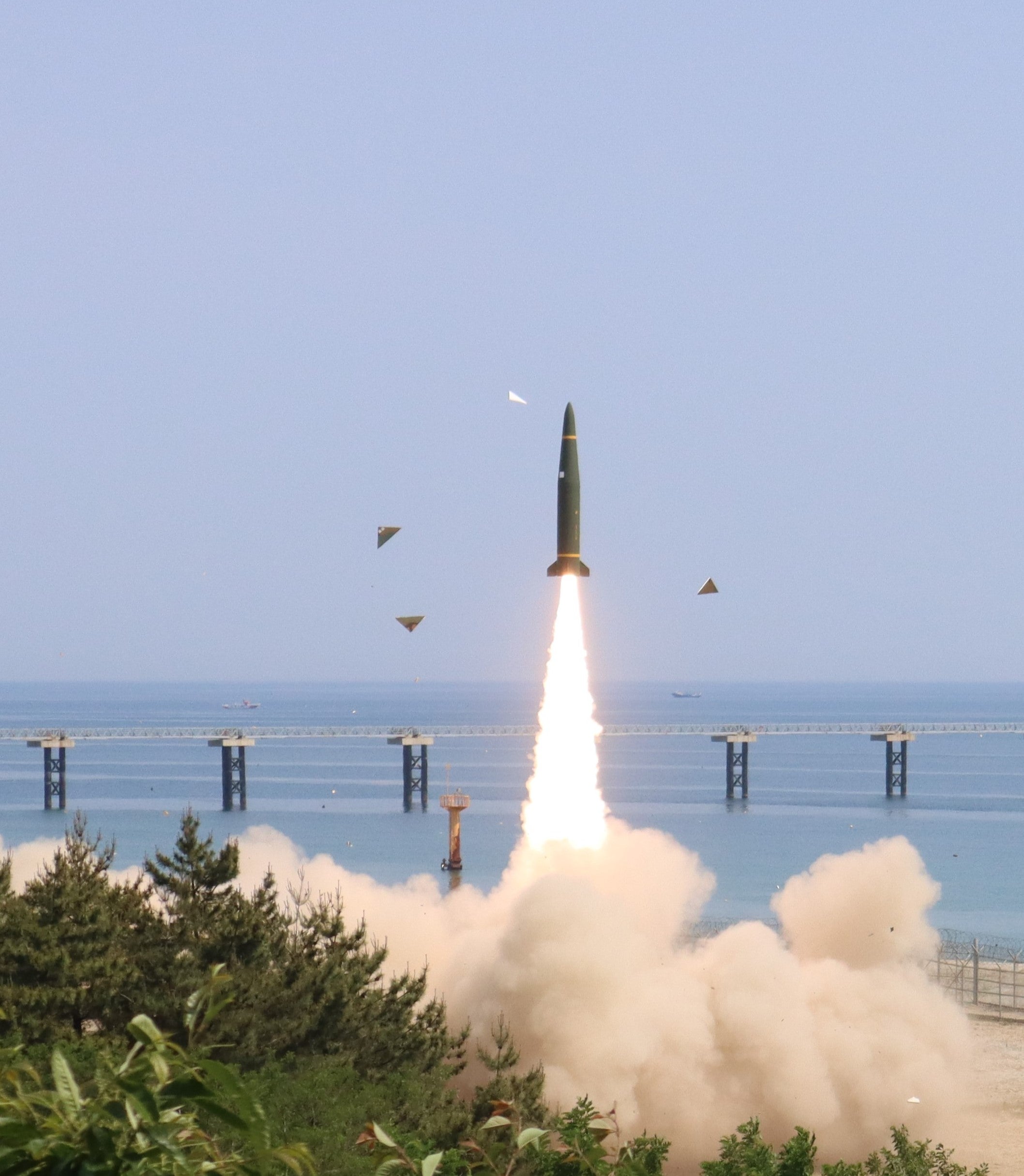 In this handout photo released by the South Korean Defense Ministry, a missile is fired during a US and South Korea joint training exercise to fire a ground-to-ground missile on 25 May 2022