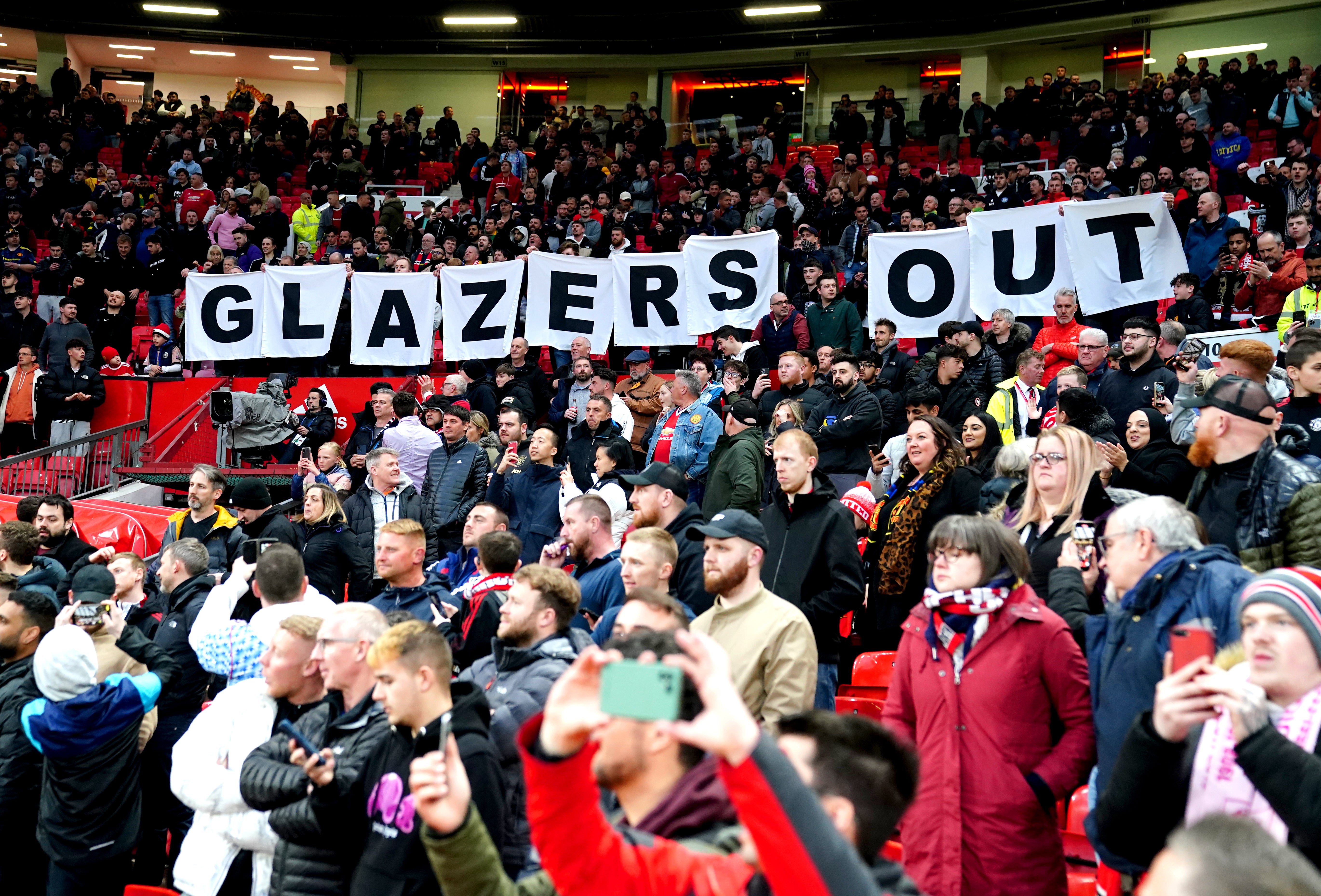 Manchester United fans protest against the Glazer family in the match against Chelsea on April 28 (Martin Rickett/PA)