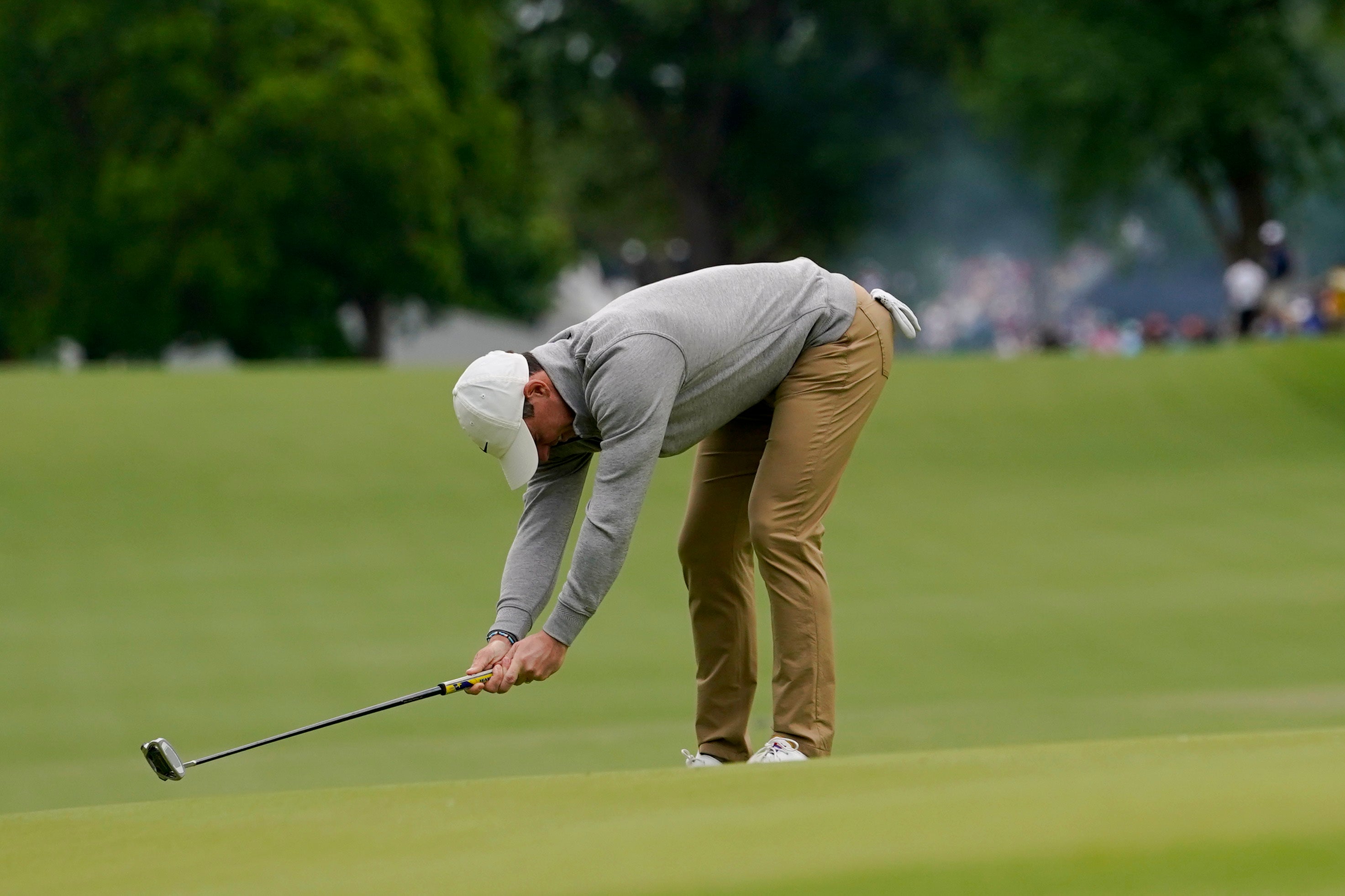 Rory McIlroy reacts after missing a putt on the sixth hole during the final round of the US PGA Championship (Matt York/AP)