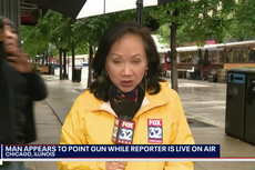 Man pulls a gun on TV crew during live report on gun violence