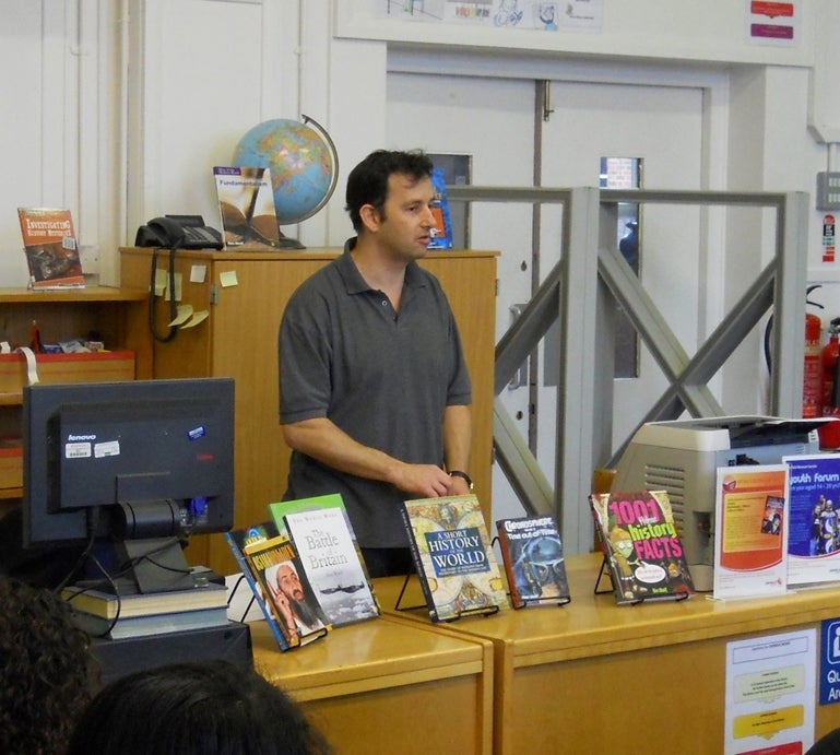 Alex Woolf doing a talk at a school in London in 2012 (Collect/PA Real Life)