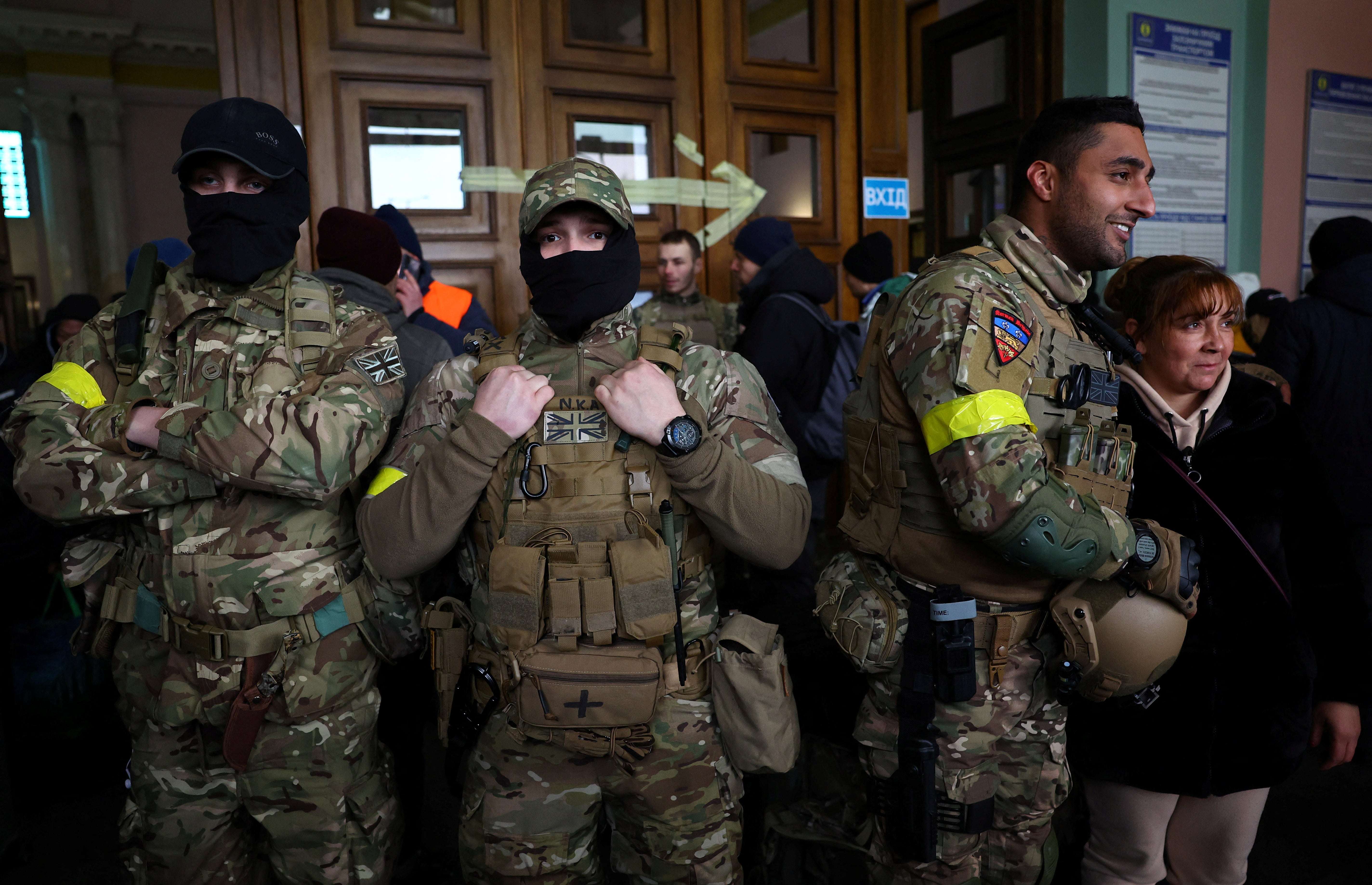 Ben Grant (right) poses for a picture on his way to Ukraine