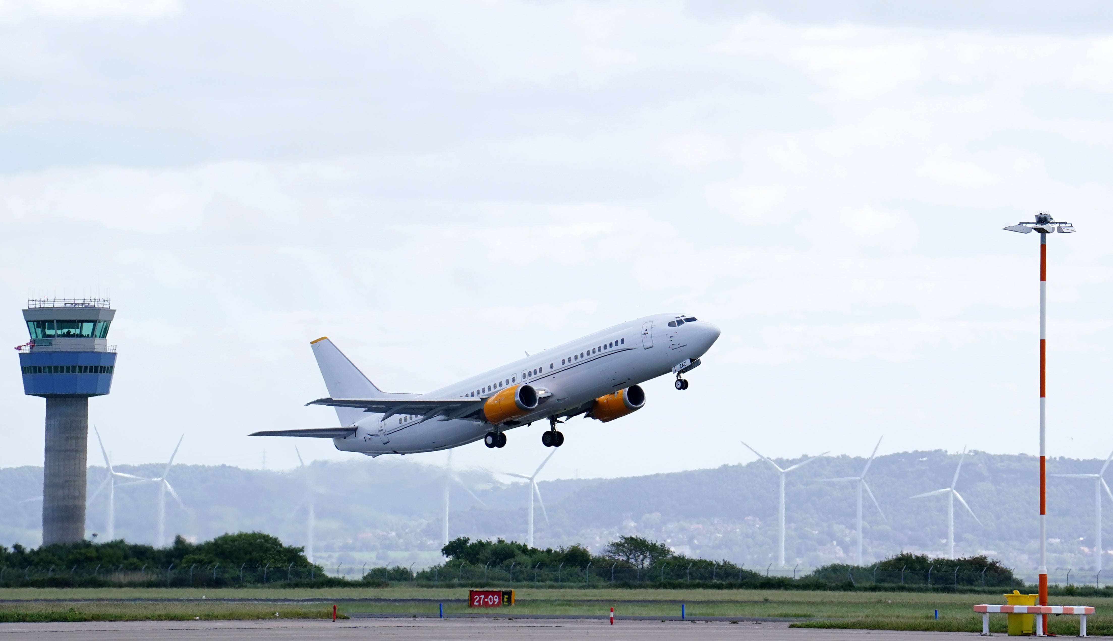 The Liverpool team plane flies out of John Lennon Airport on Friday (Martin Rickett/PA)