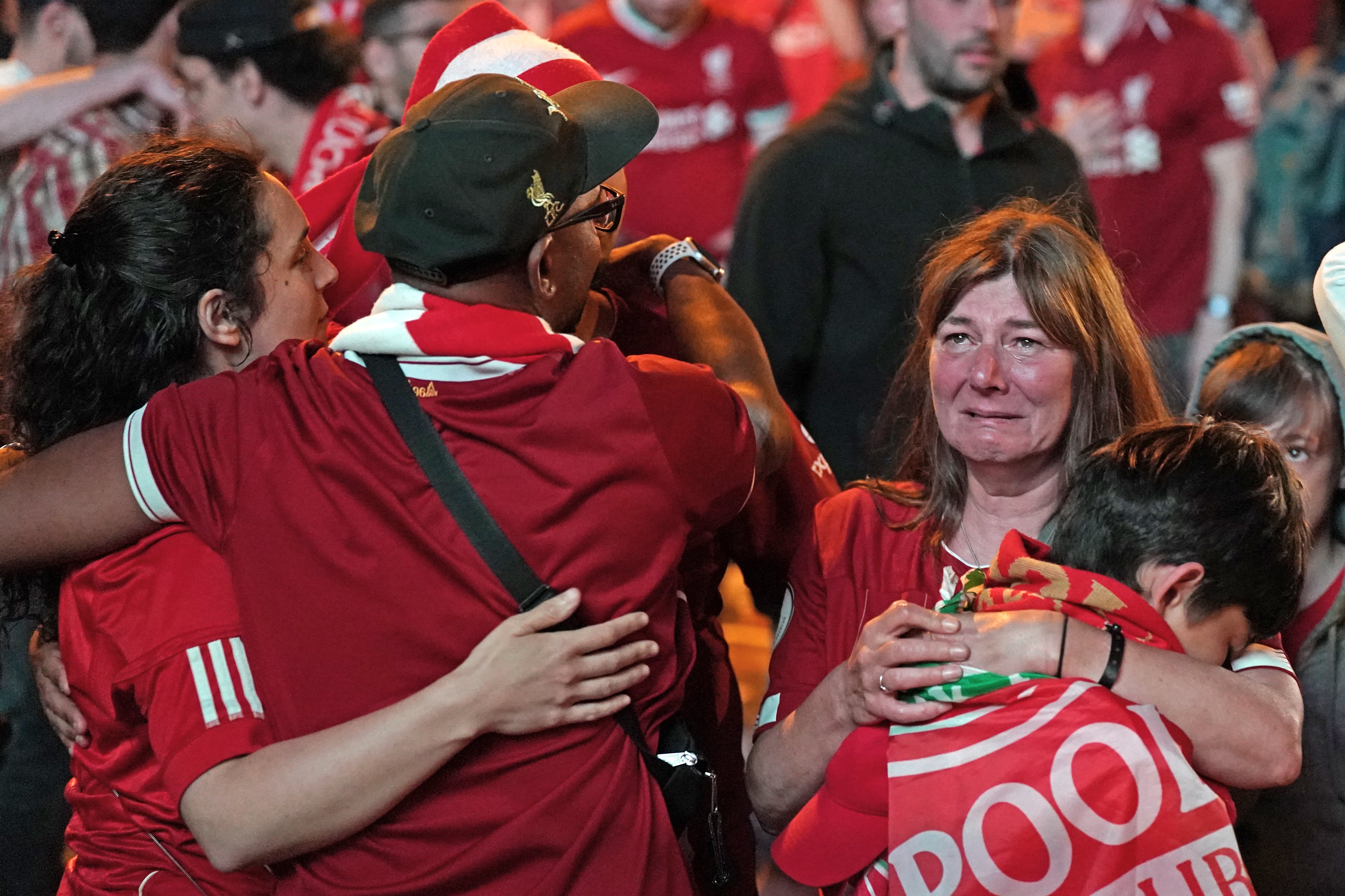 Liverpool fans in the fanzone in Paris, watching on the big screen their team losing to Real Madrid in the Champions League Final (Jacob King/PA)