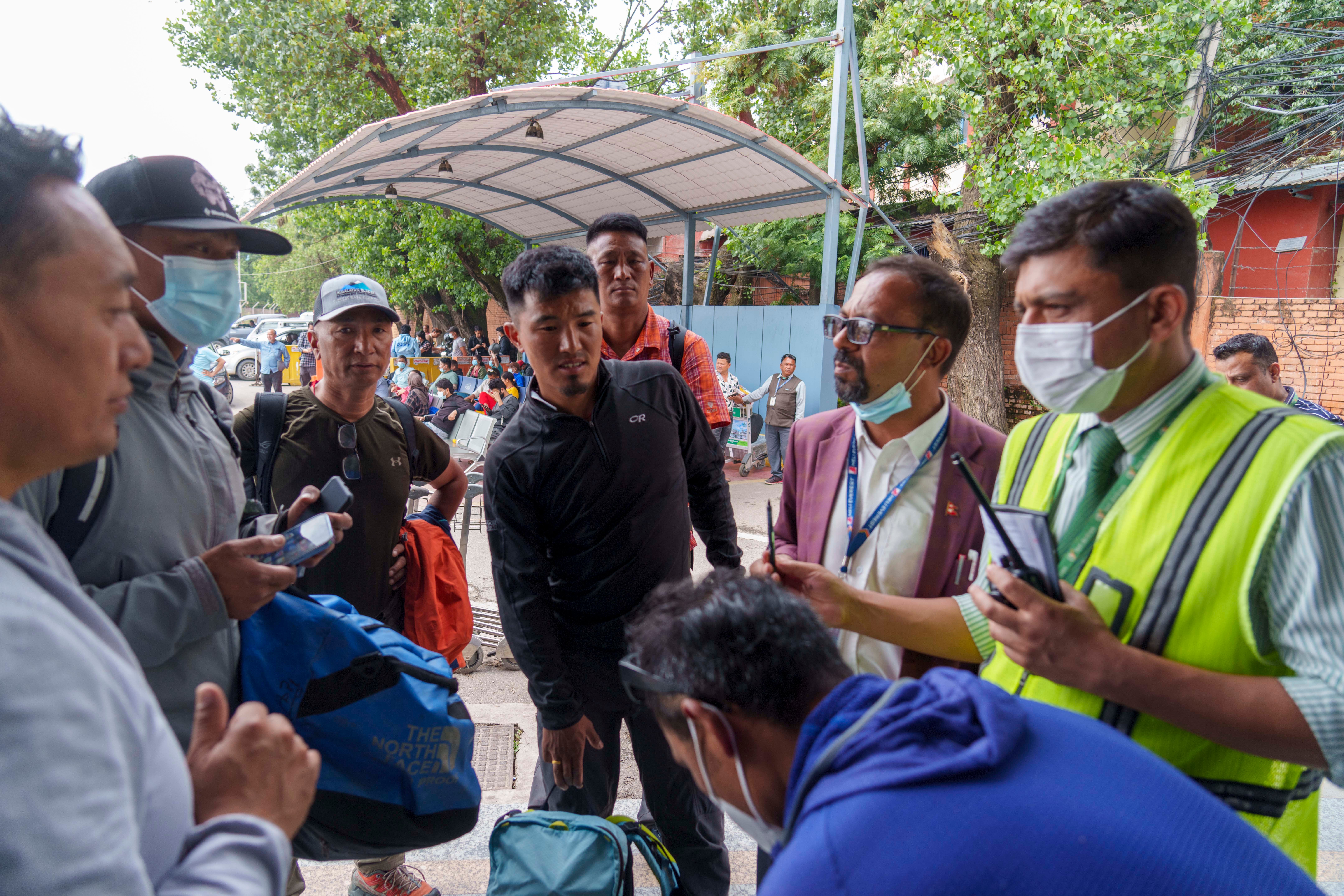 A team of climbers prepare to leave for rescue operations from the Tribhuvan International Airport in Kathmandu, Nepal on Sunday 29 May