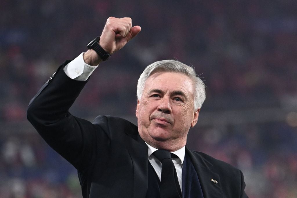 Carlo Ancelotti celebrates his team's victory over Liverpool at the Stade de France