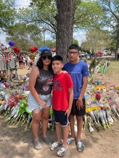 Lisa Camarillo, 38, drove from Laredo, Texas with her two sons to pay her respects to the families of the victims