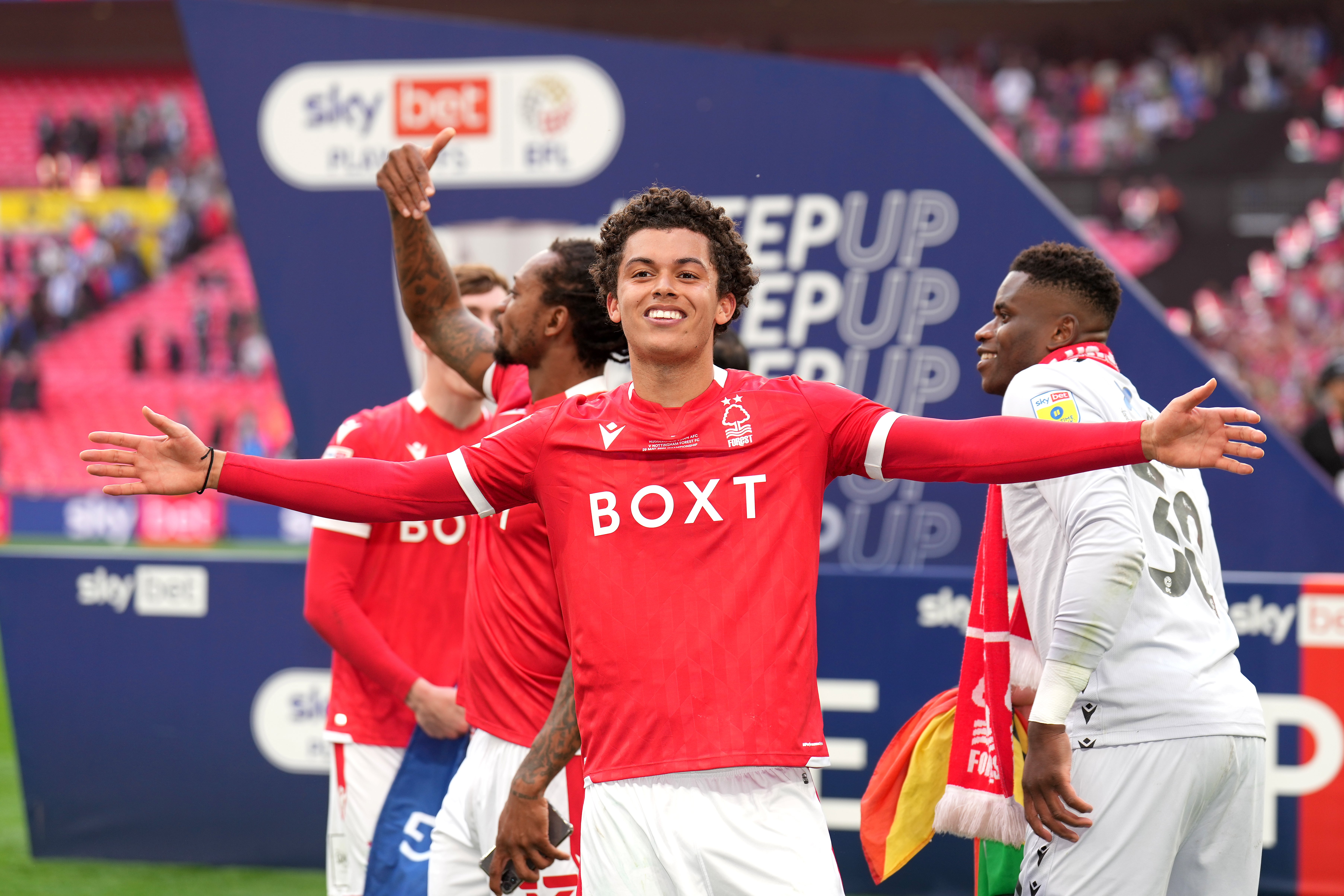 Brennan Johnson celebrates Nottingham Forest’s promotion to the Premier League on Sunday (John Walton/PA)