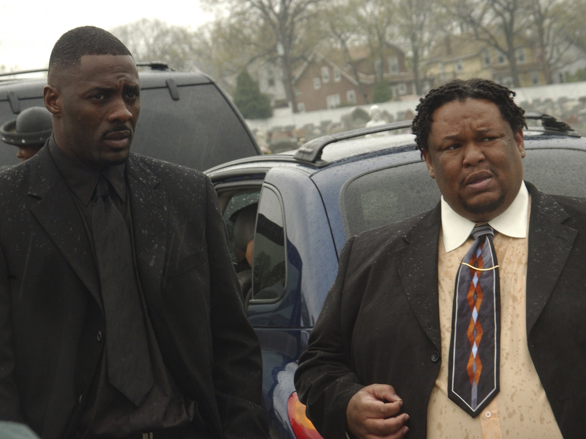 Idris Elba as Stringer and Robert Chew as Proposition Joe in ‘Backwash’