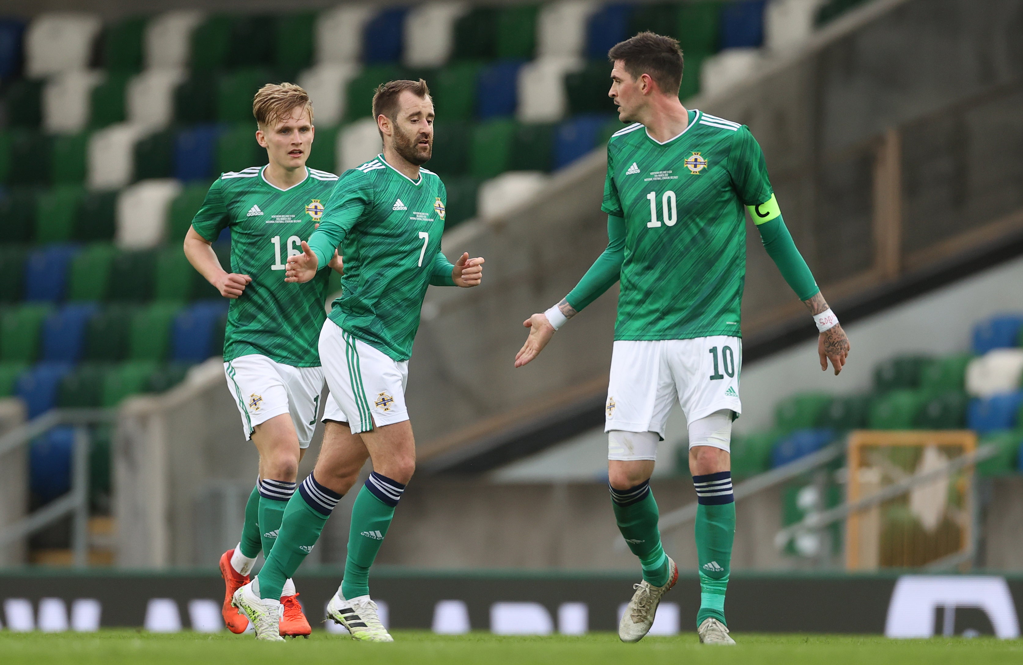 Niall McGinn, centre, believes Kyle Lafferty, right, can help solve Northern Ireland’s problems in front of goal (Liam McBurney/PA)