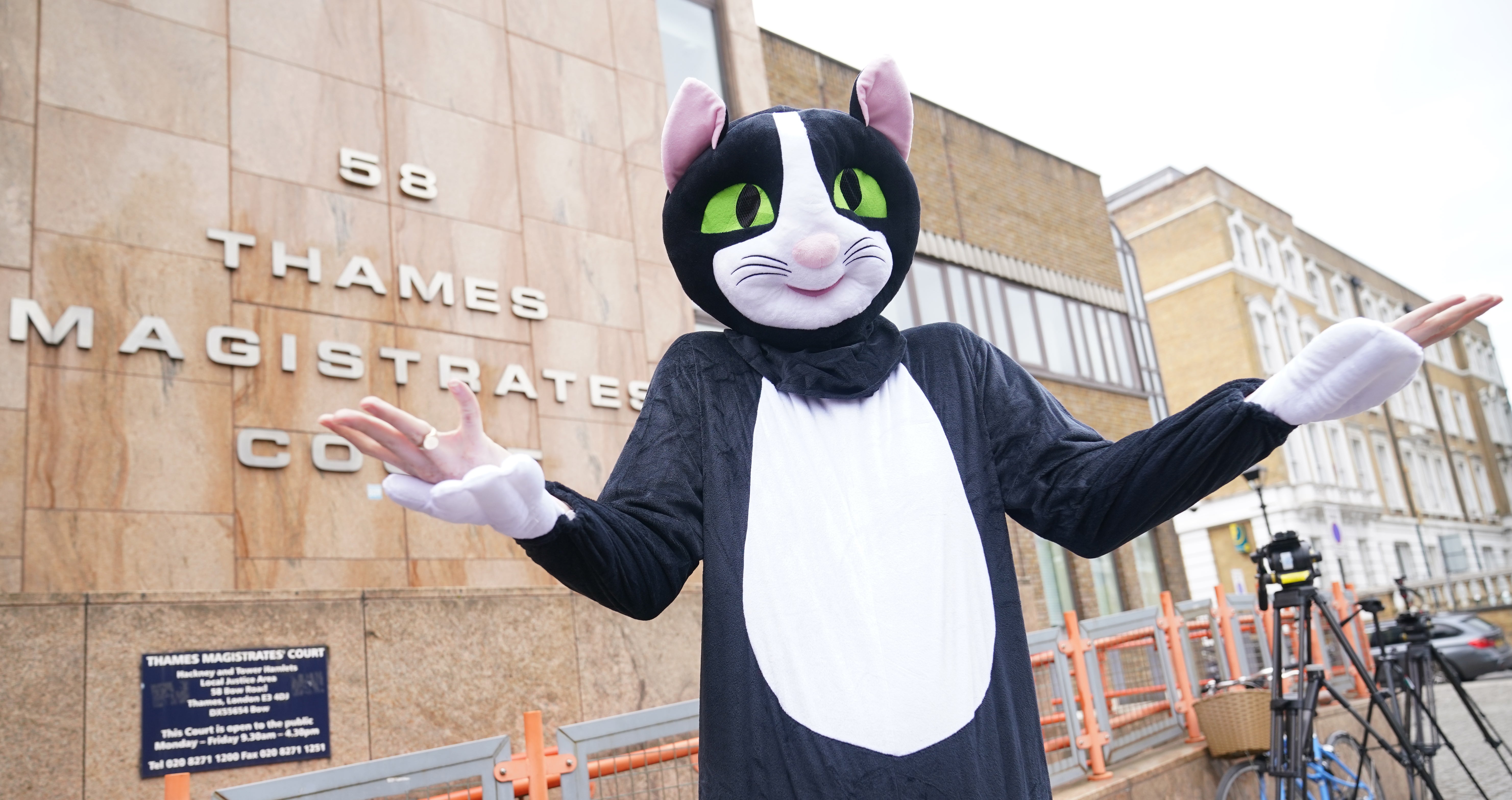 A person dressed as a cat outside Thames Magistrates' Court, London, where West Ham defender Kurt Zouma was sentenced