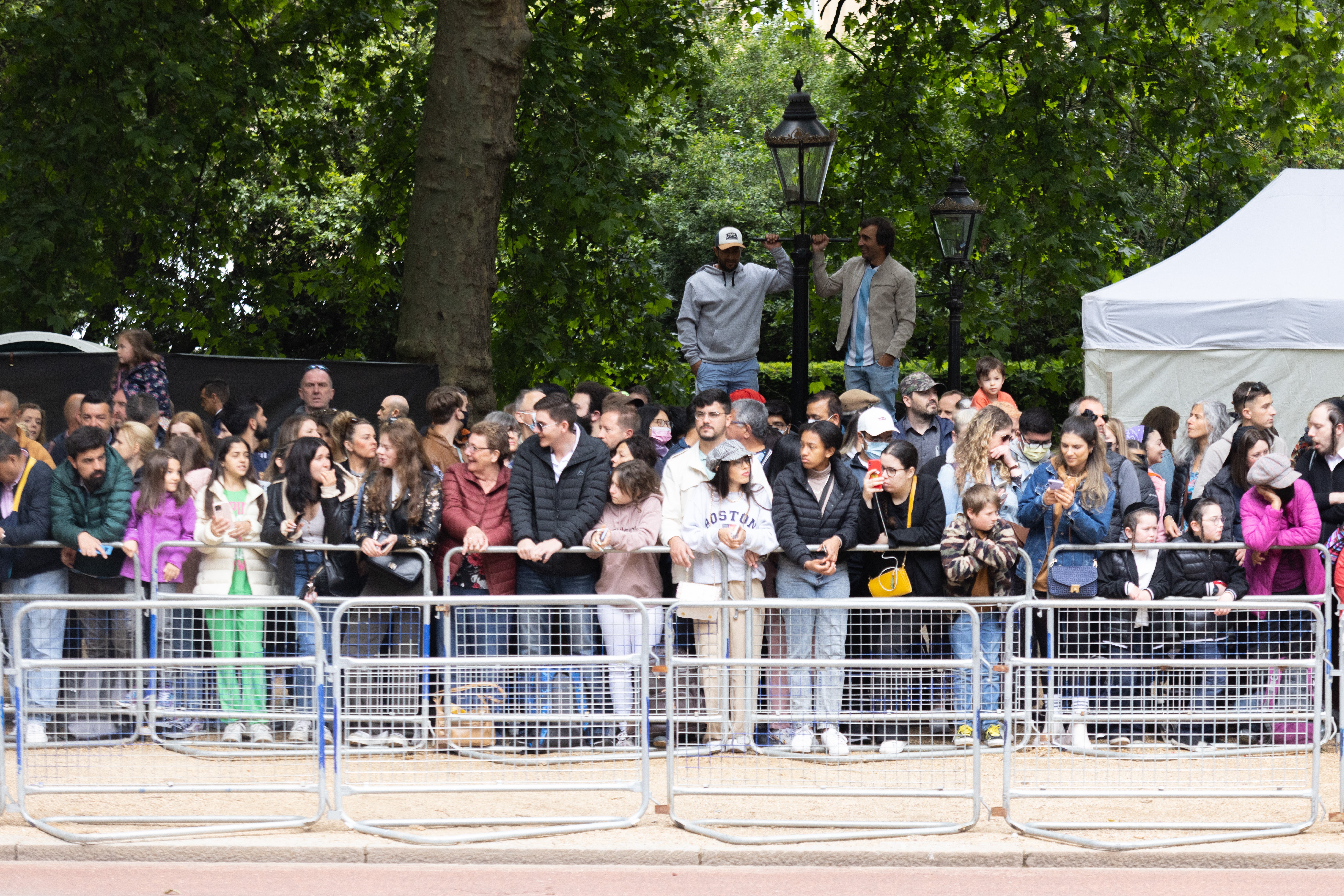 Crowds line The Mall, in central London, where well-wishers are already camping out for the best spots (James Manning/PA)