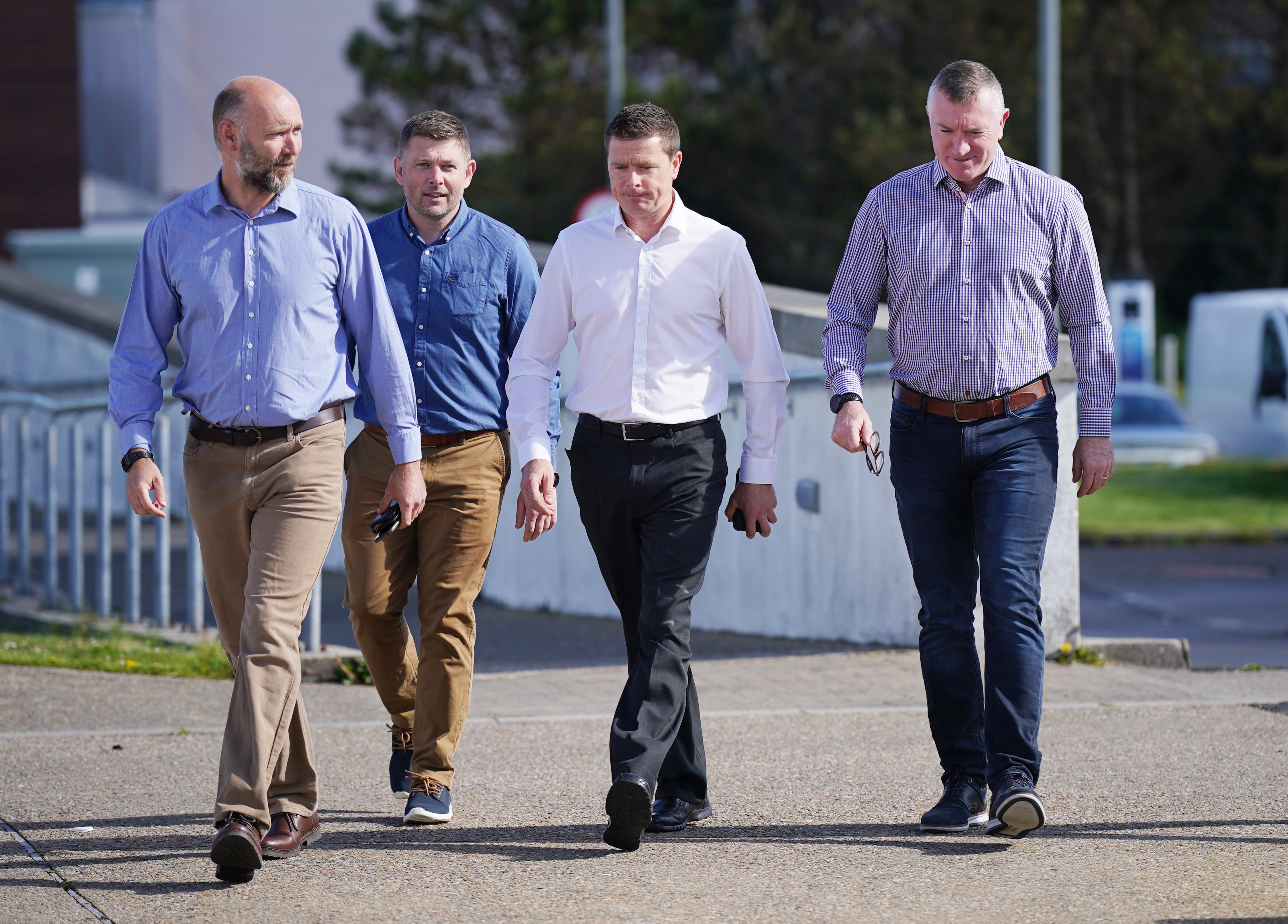 (Left-right) Captain Michael Scott, Engineer Simon Sweeny, Tommy Fitzsimons and winchman Philip Wrenn arriving at the inquest (Niall Carson/PA)