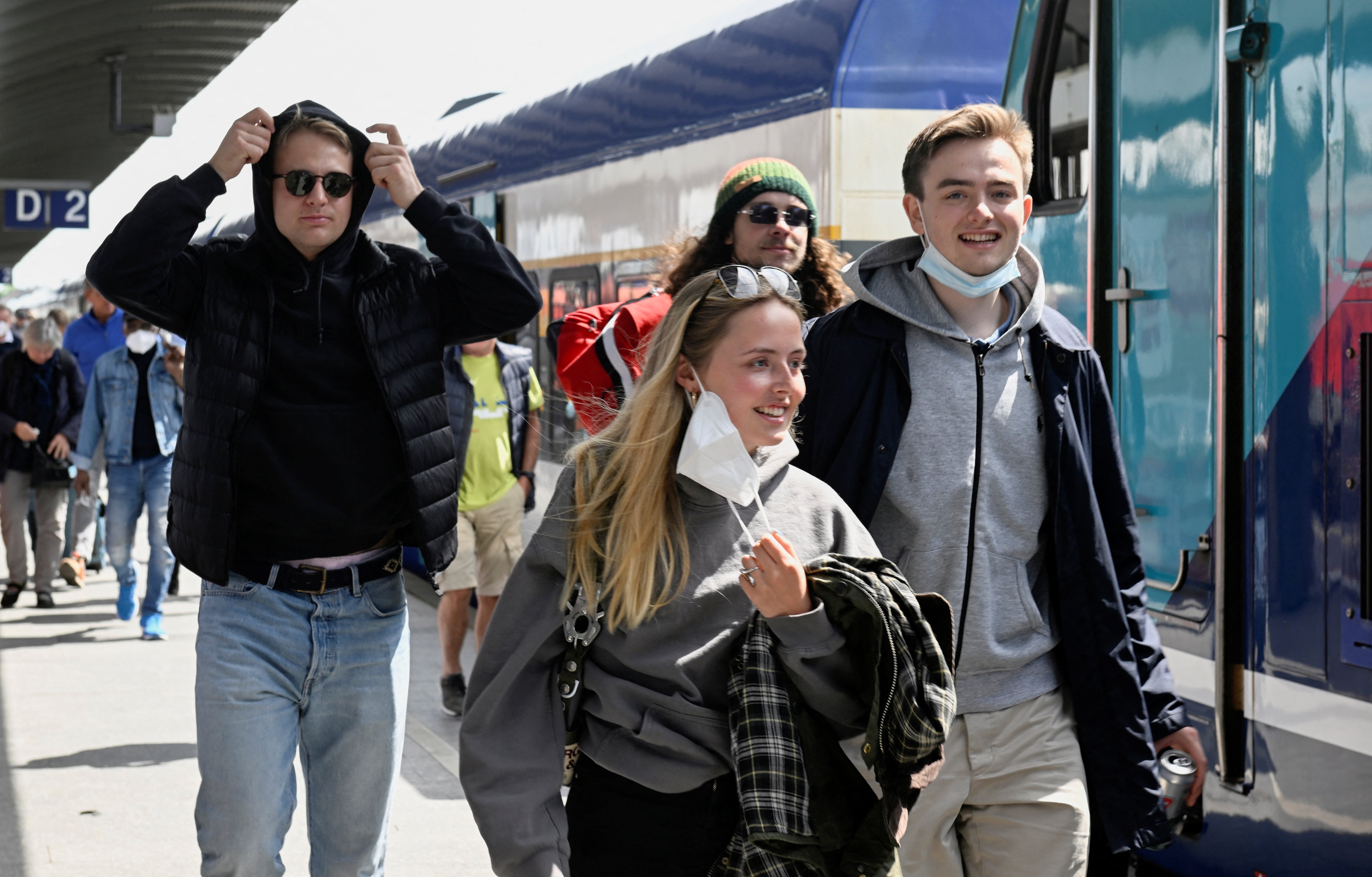 Rail passengers in Germany on the first day that the super-cheap train pass was introduced on 1 June