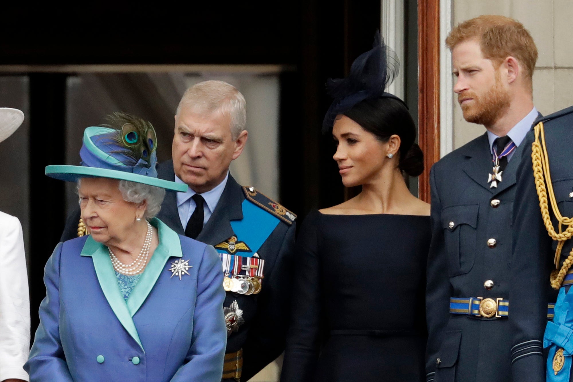 Harry and Meghan with the Queen and Prince Andrew on the Buckingham Palace balcony in 2018 for an RAF flyover