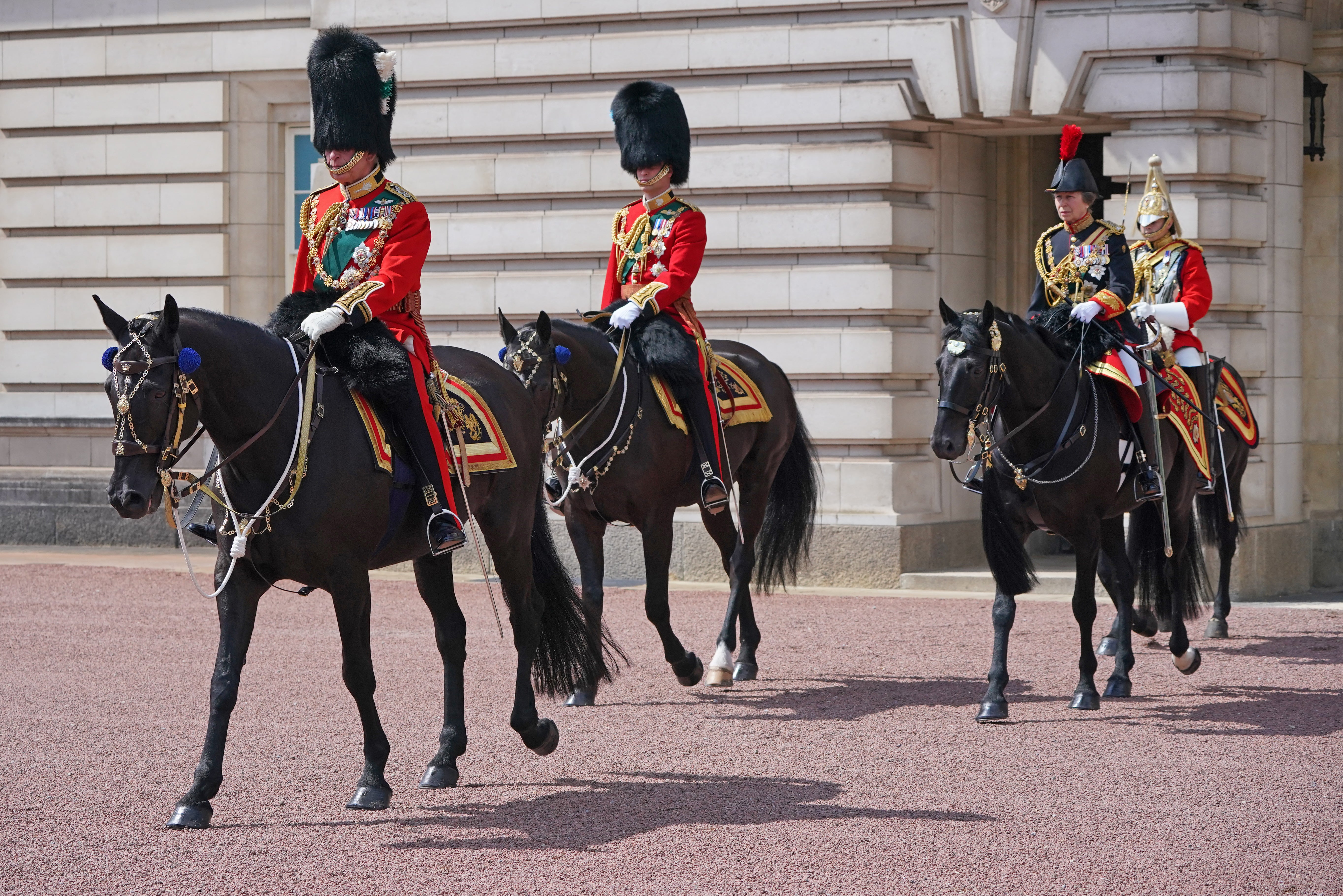 From left, Prince Charles, Prince William and Princess Anne partook and received the symbolic salute for the first time during the parade.